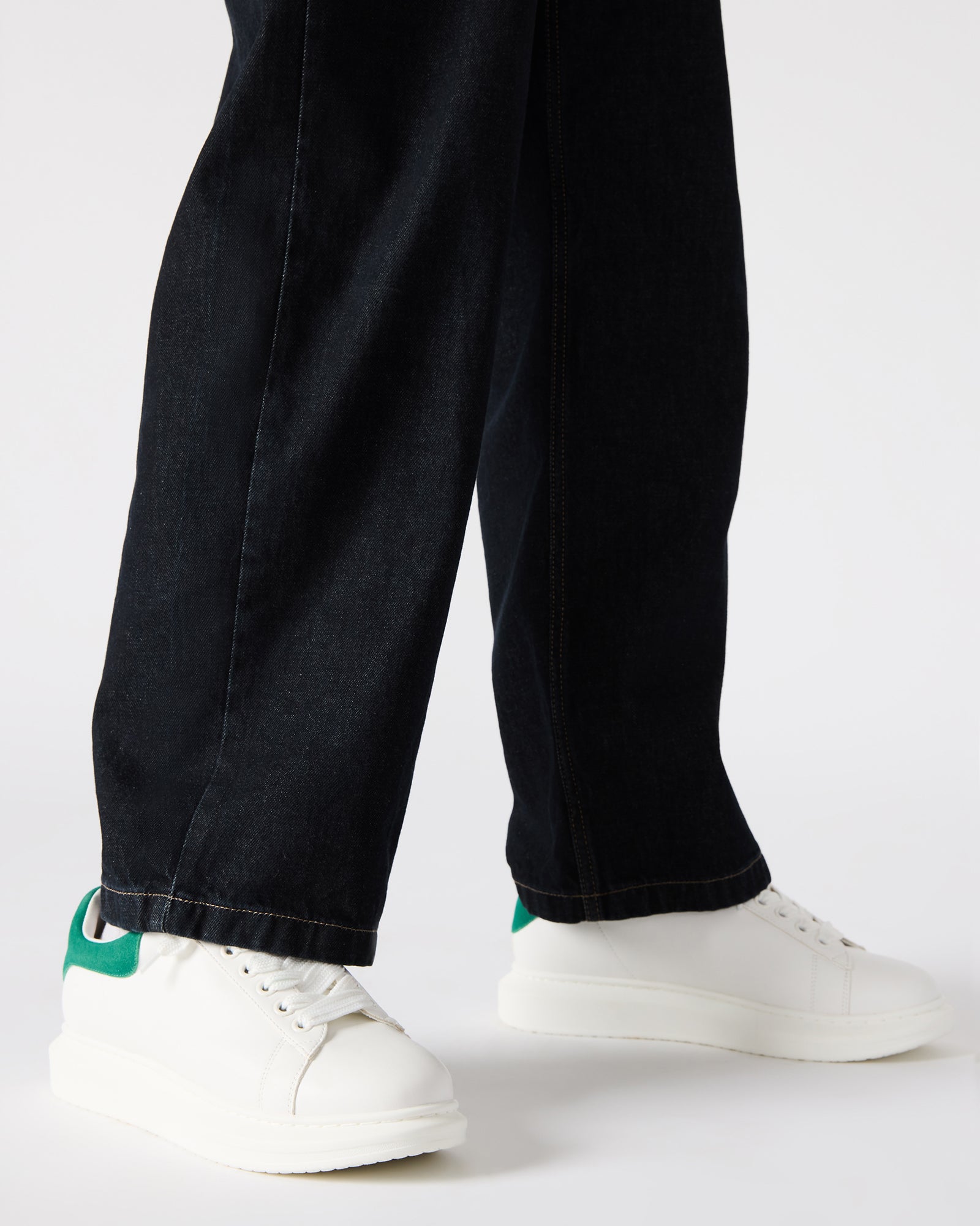 Close-up of the suede and synthetic upper on the casual platform shoes