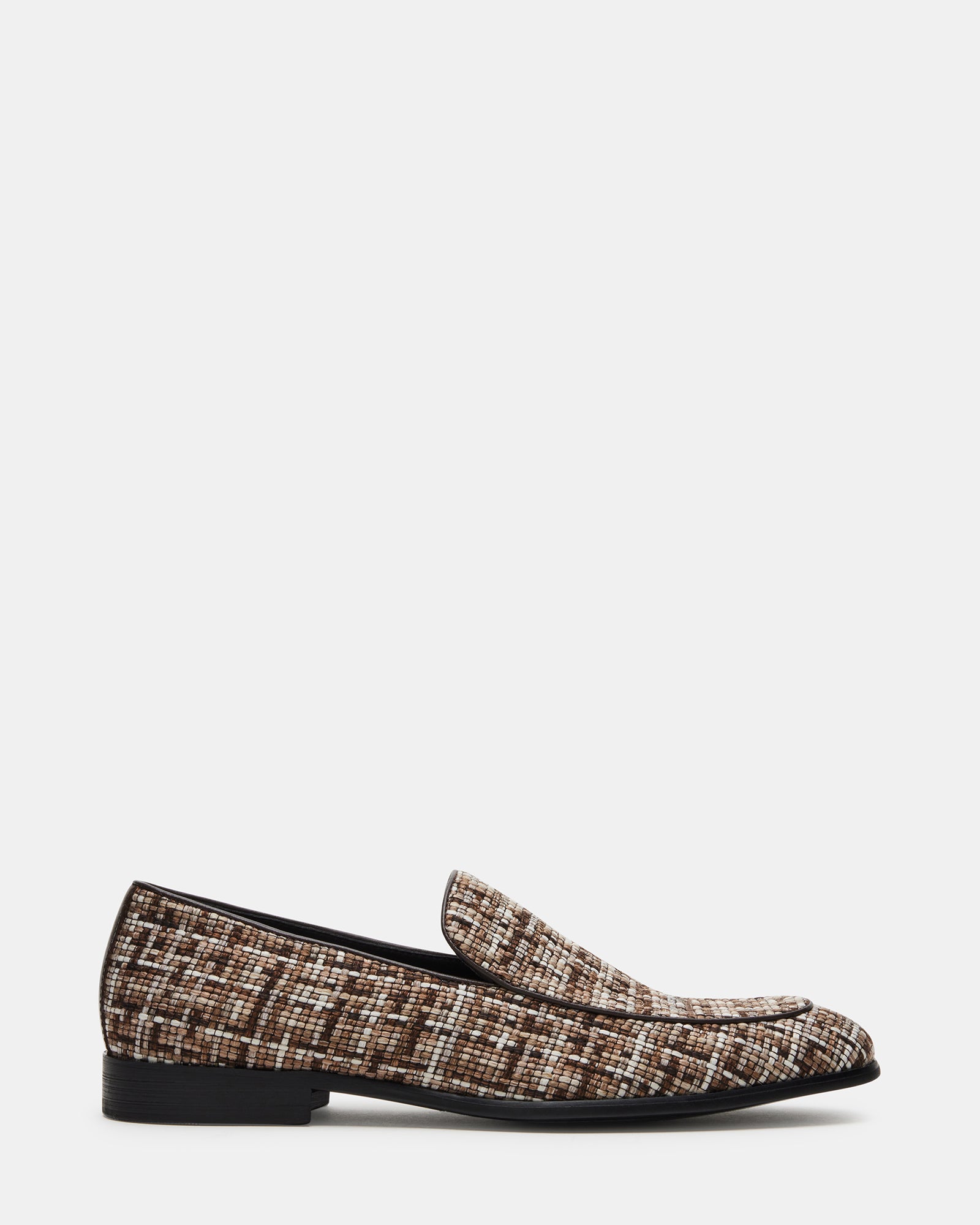 Side view of Galia brown tweed dress loafers styled with a navy suit