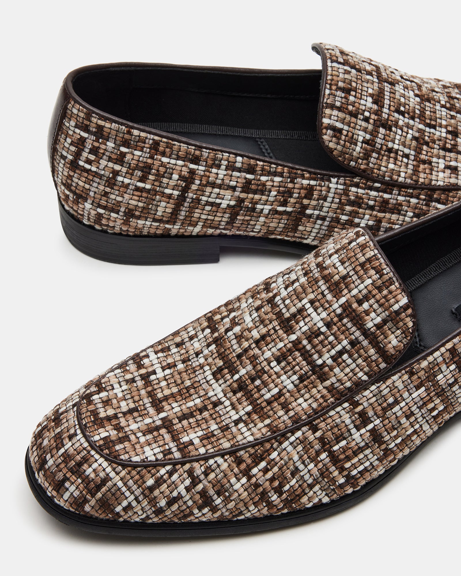 Galia loafers worn with tailored pants, perfect for office or evening wear