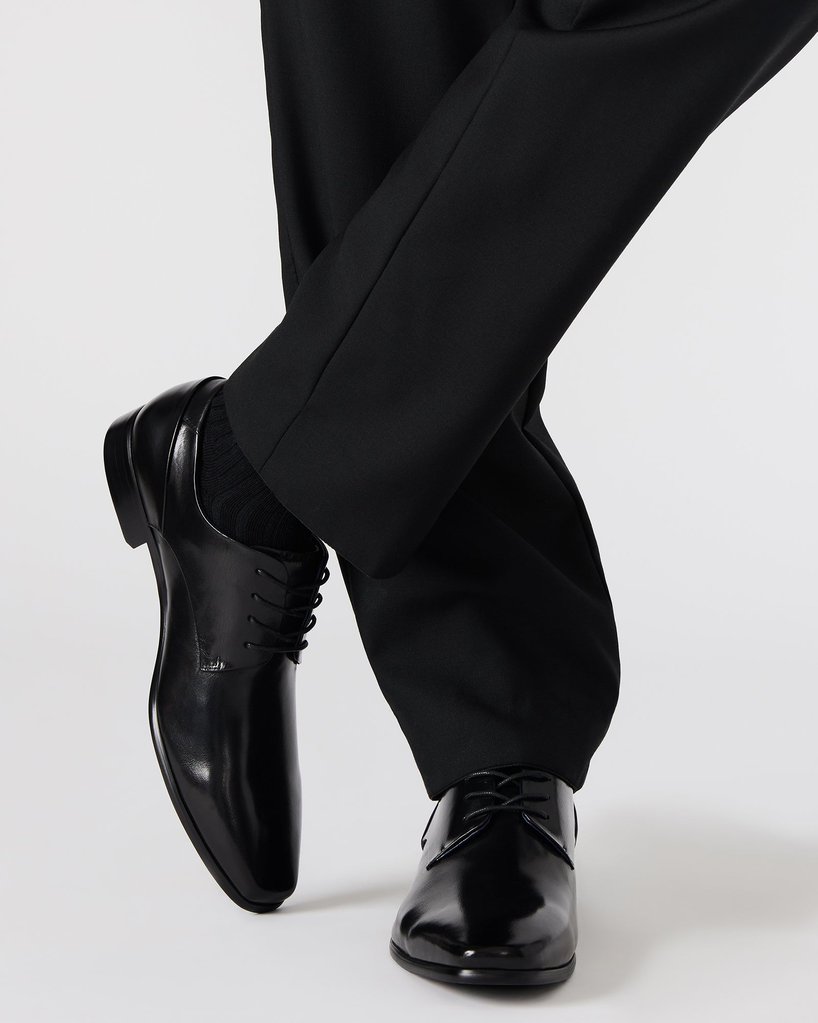 Gemari dress shoes paired with formal attire