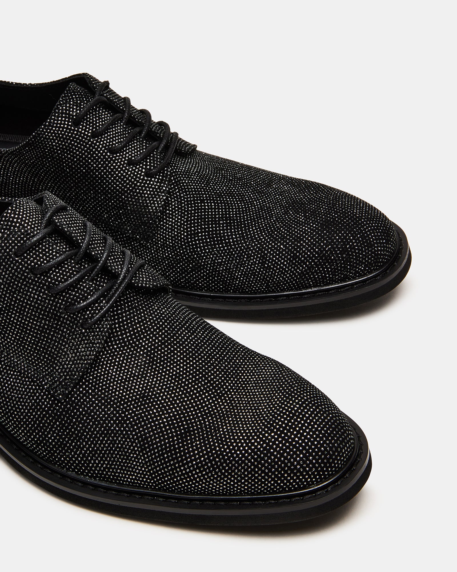 Hadar shoes paired with tuxedo pants showcasing the 1-inch heel