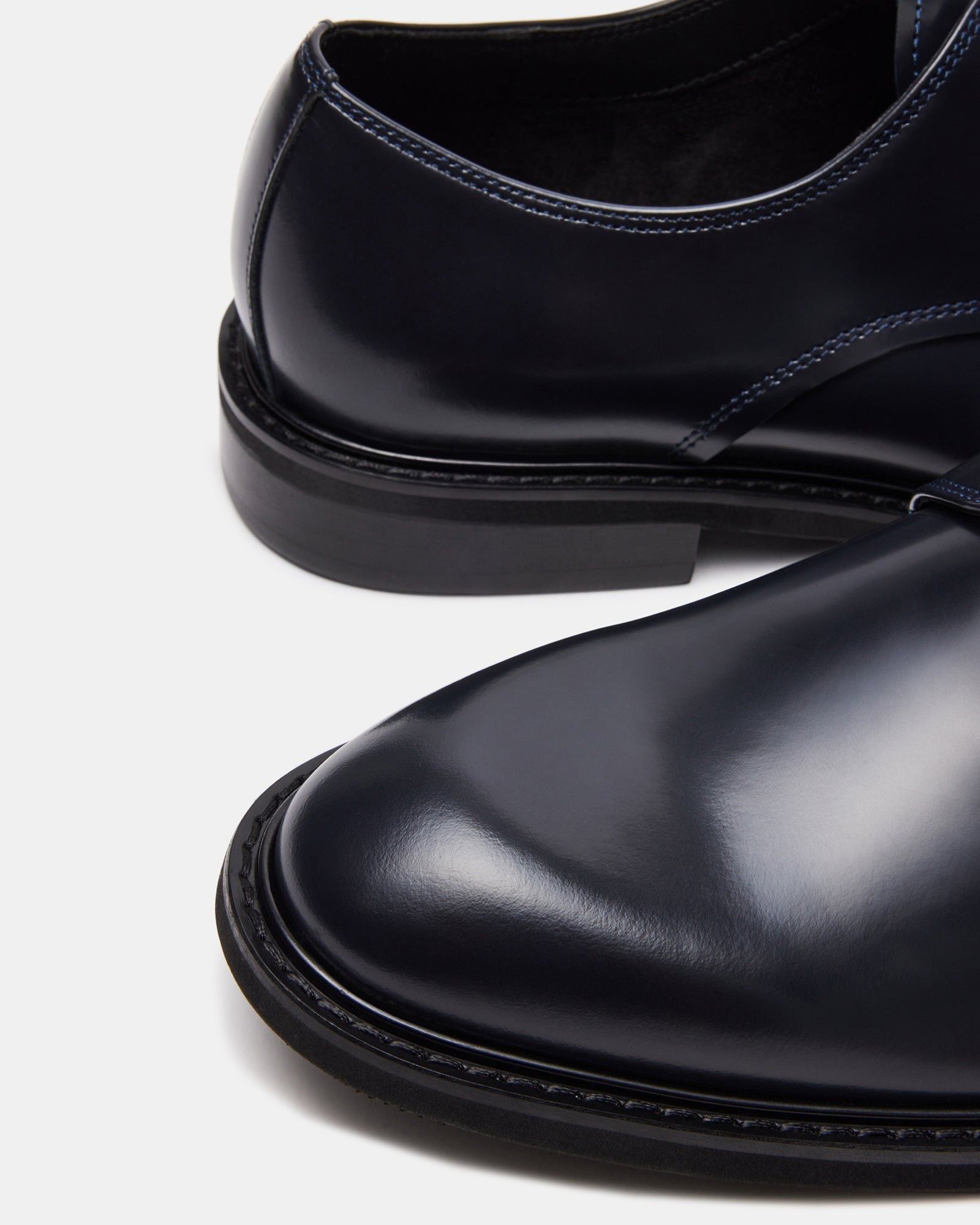 Close-up of premium box leather texture on dress shoes