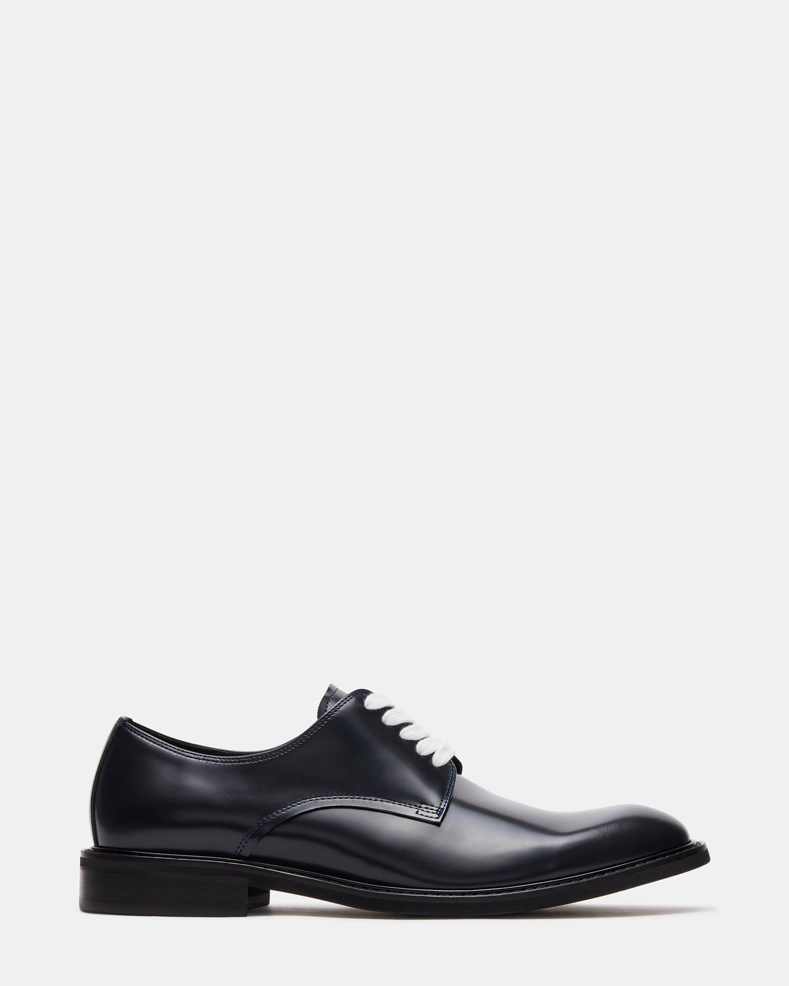 Close-up of premium box leather texture on dress shoes