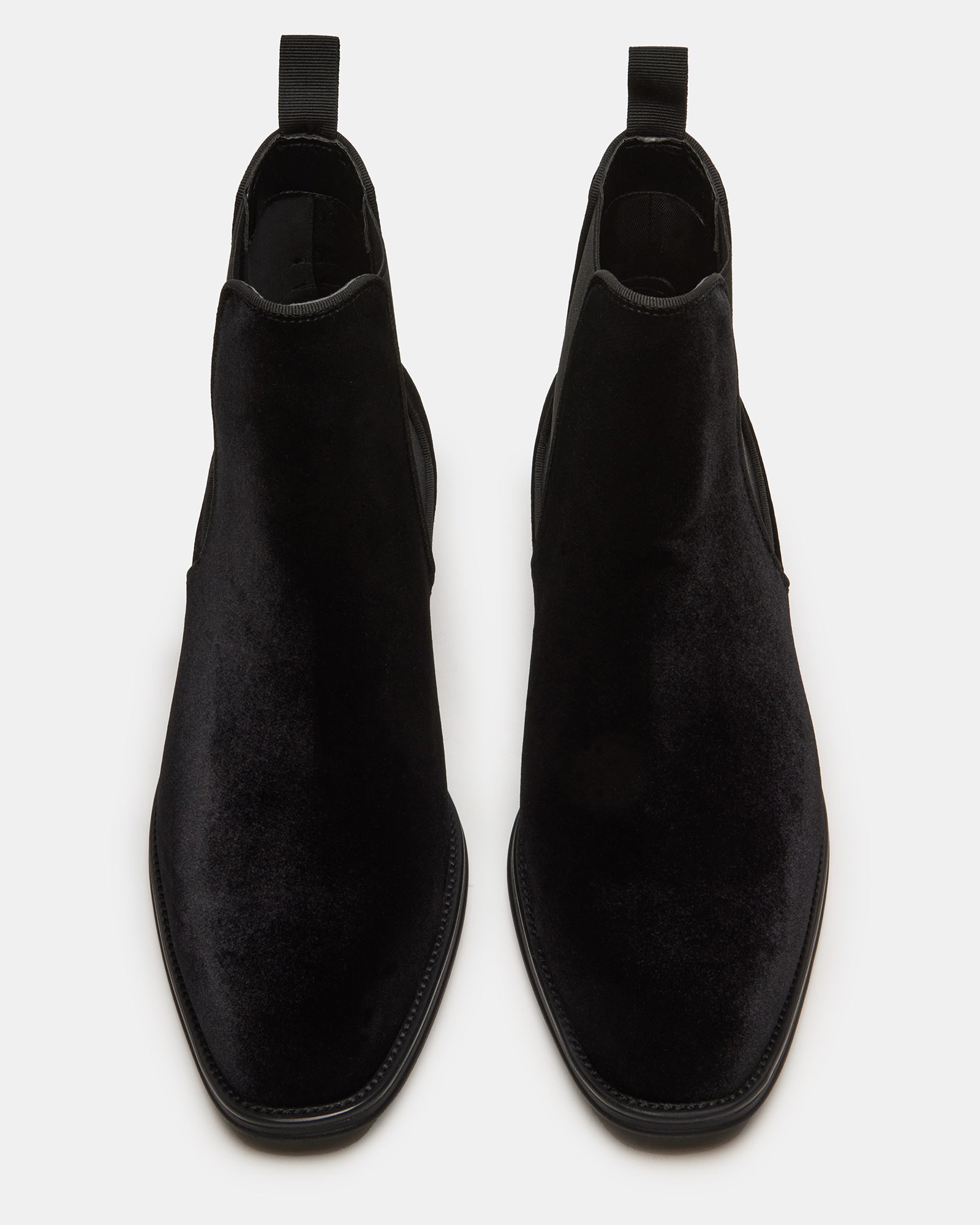 Side view of HAMLIN black velvet Chelsea boots showcasing plush upper and pull tab