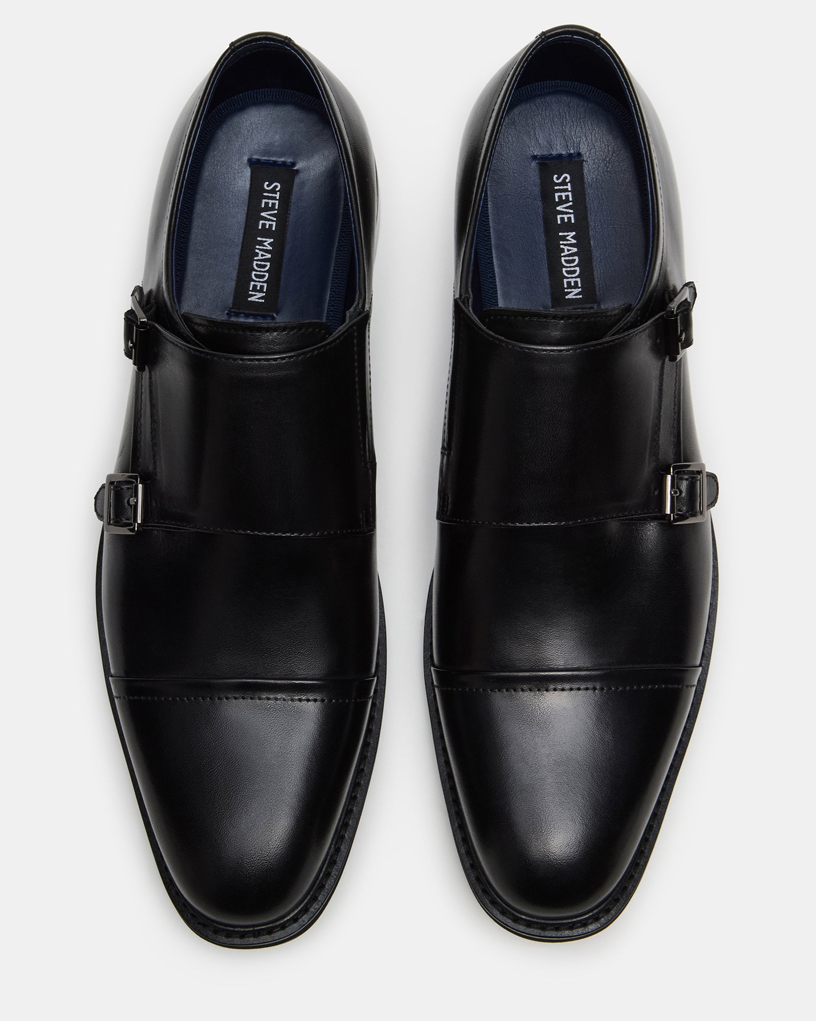 Stylish black dress shoes for men, perfect for formal occasions.