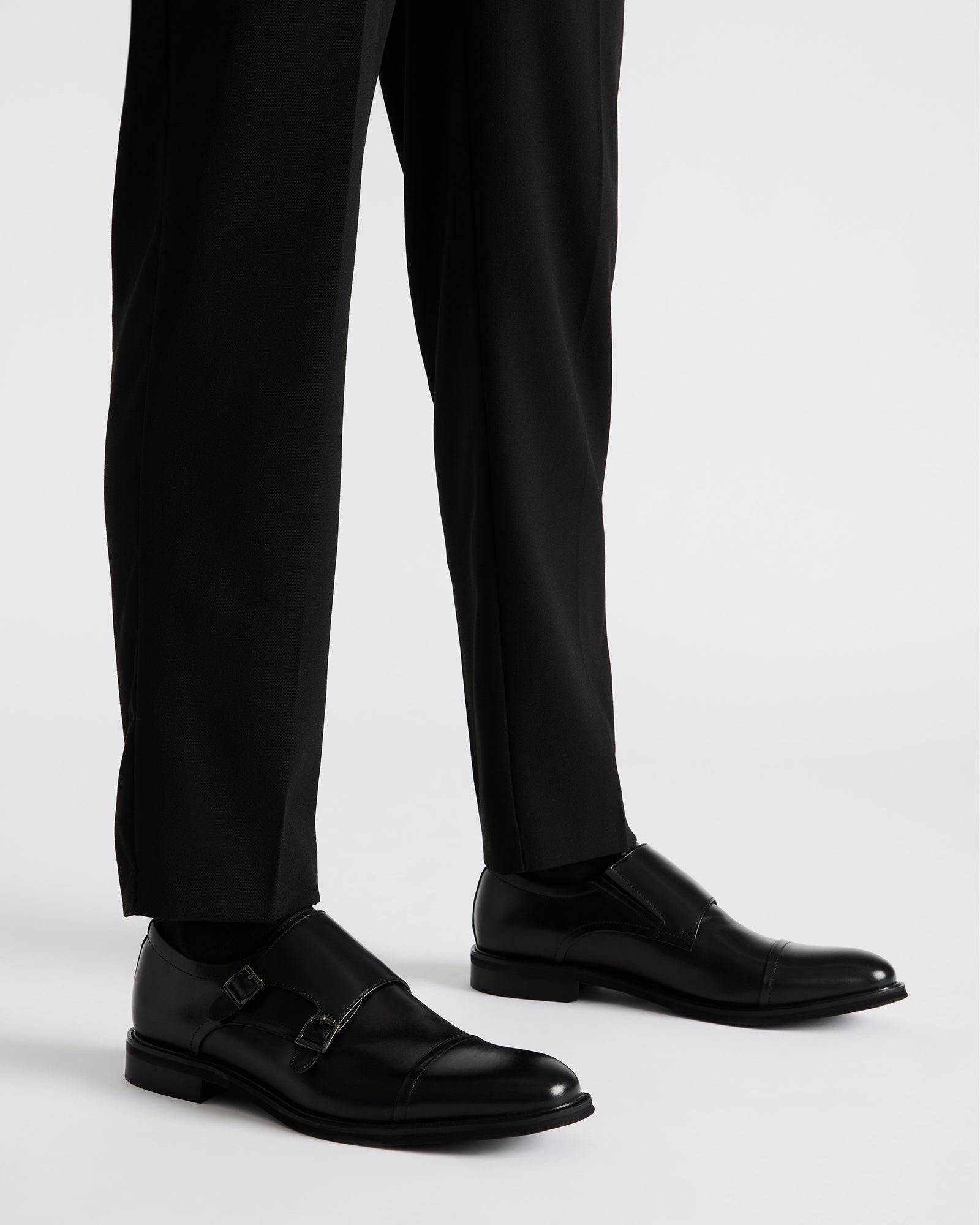 Stylish black dress shoes for men, perfect for formal occasions.