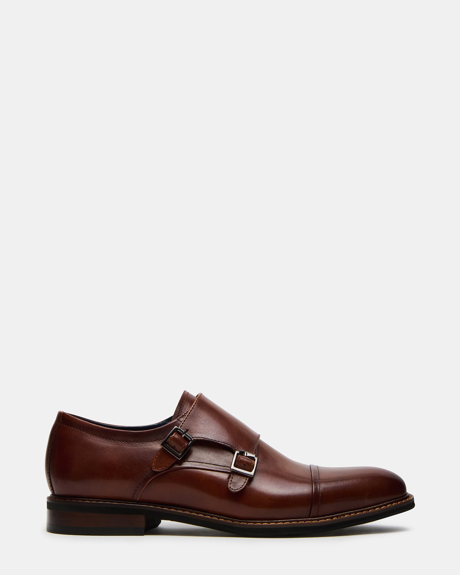 Side view of elegant black men's dress shoes with buckle design.