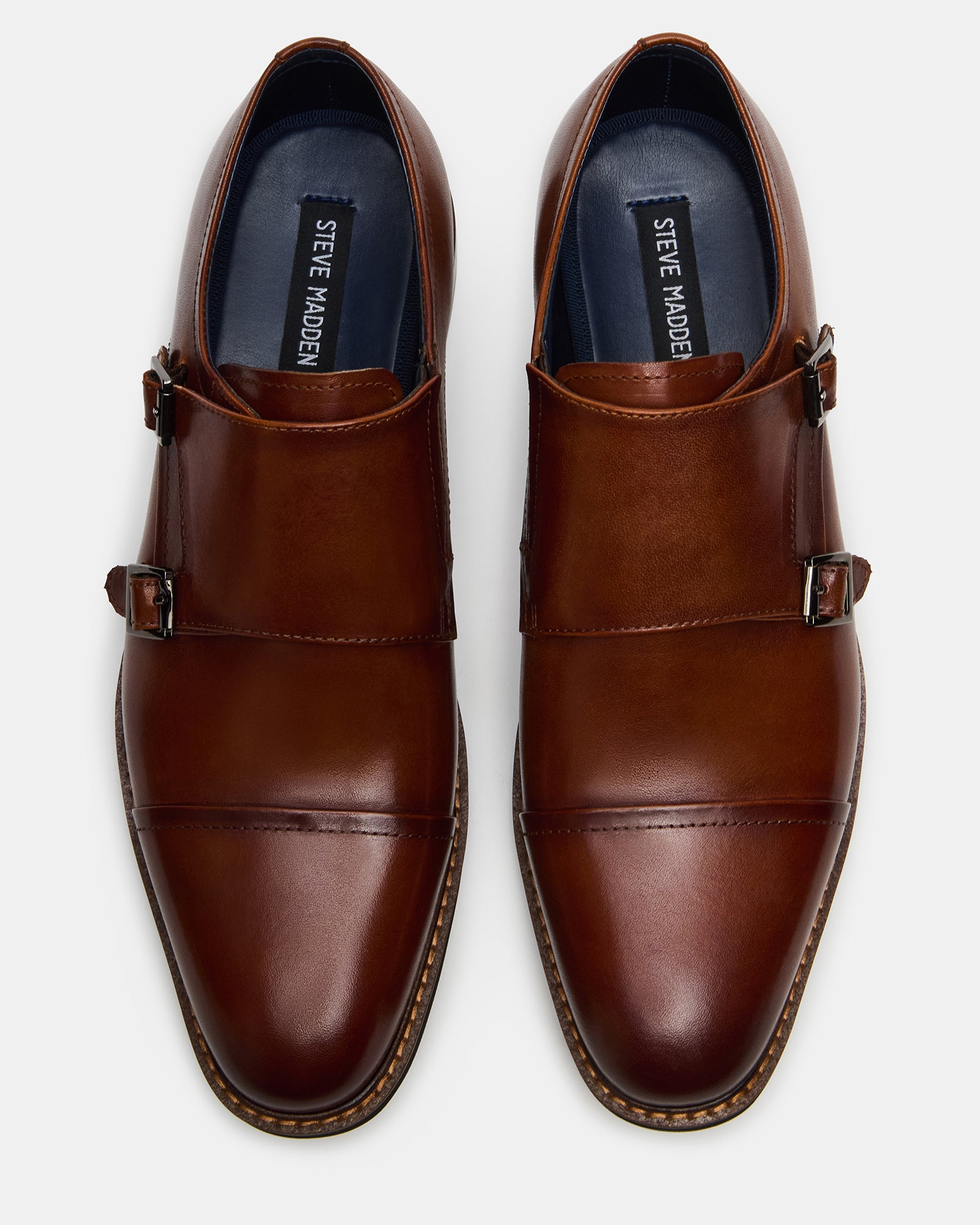Close-up of leather buckle on formal shoes for men.