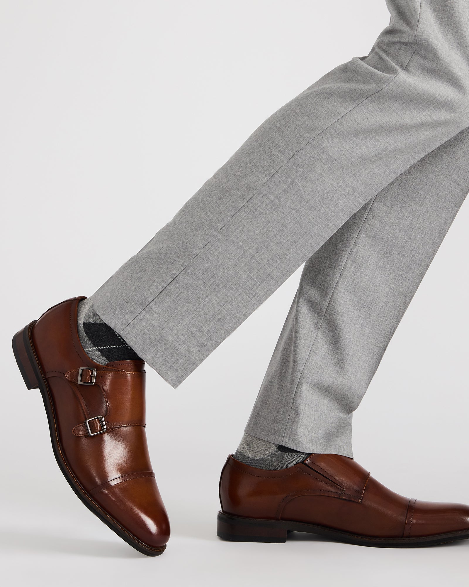 Close-up of leather buckle on formal shoes for men.