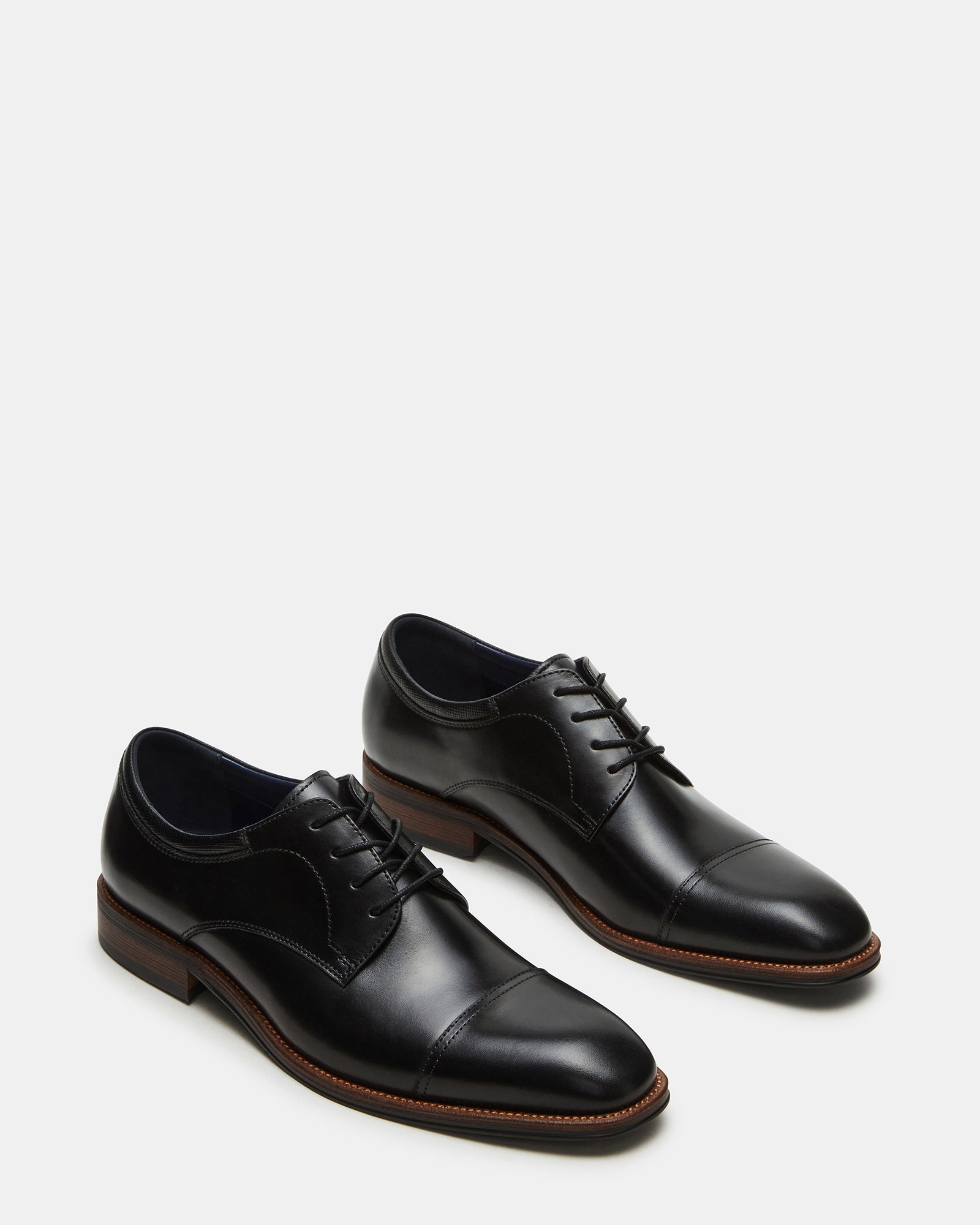 Side profile of HASEN dress shoes highlighting the 1-inch heel and rubber sole