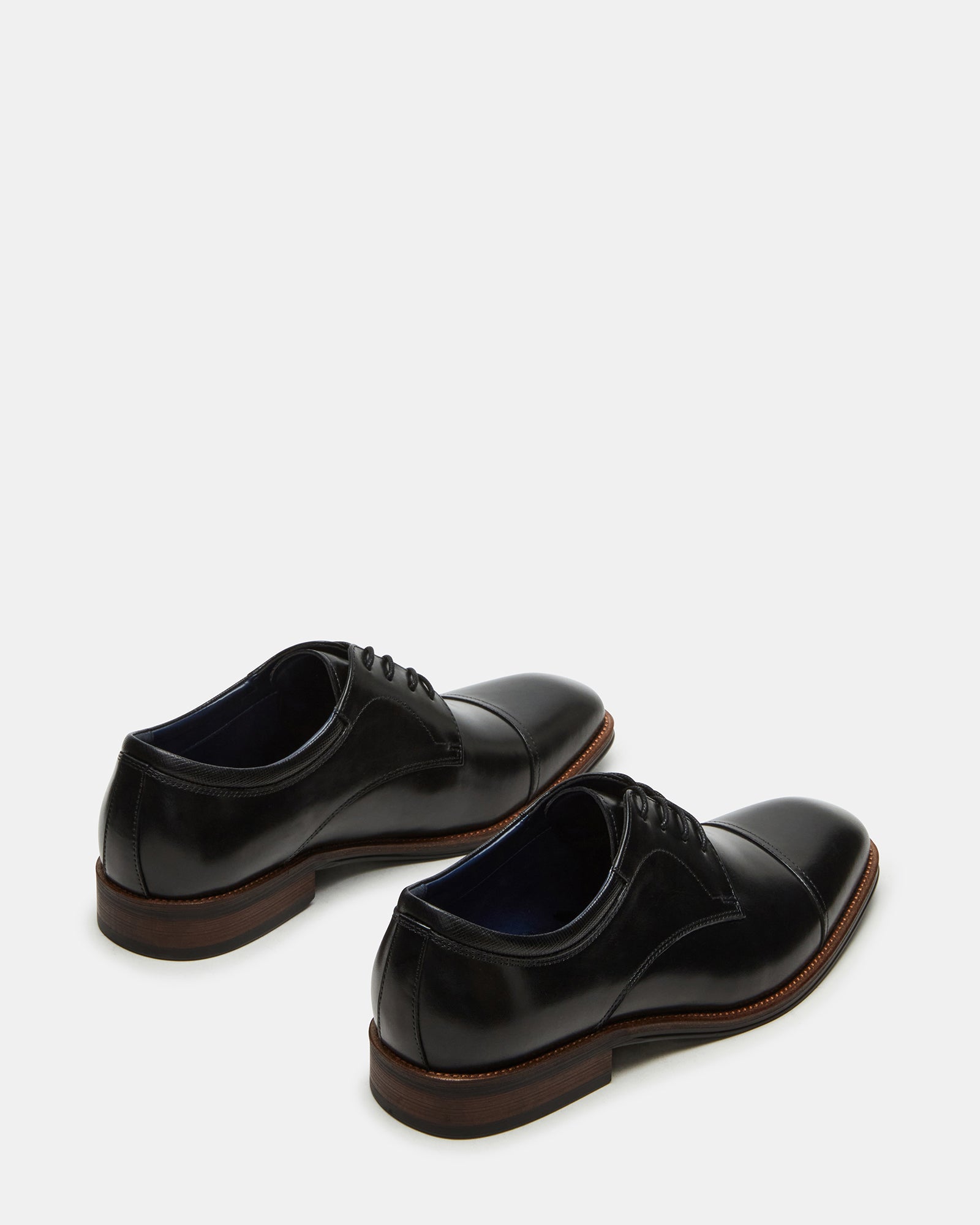 Side profile of HASEN dress shoes highlighting the 1-inch heel and rubber sole