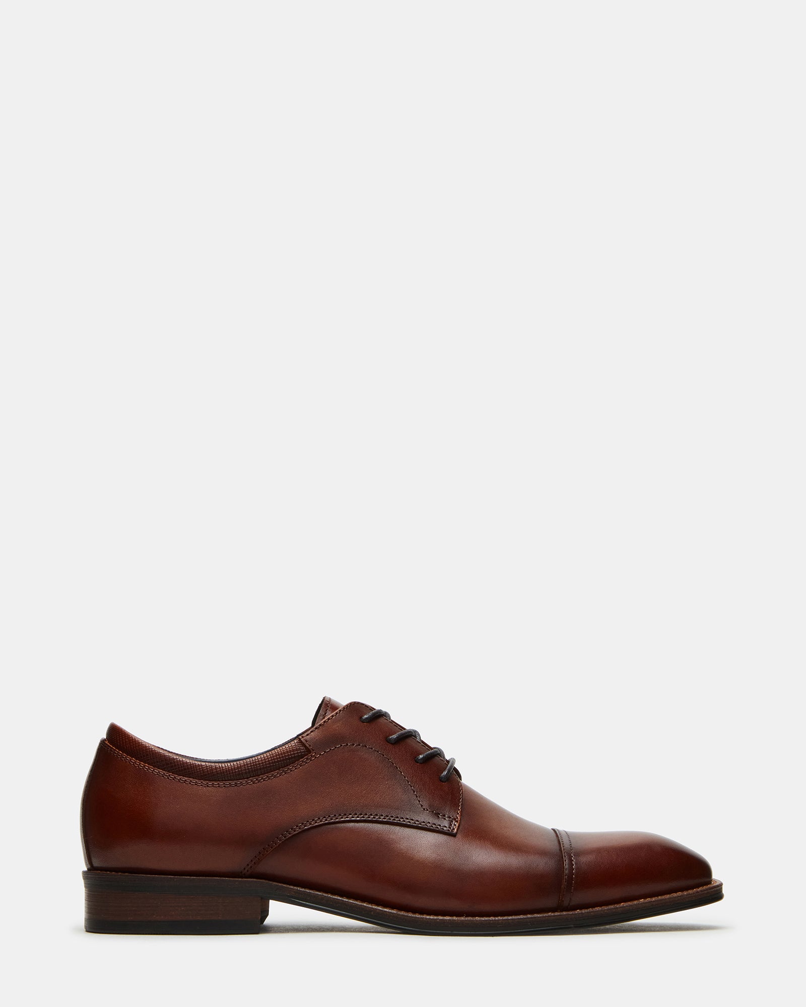 Front view of HASEN tan leather dress shoes on a wooden surface.