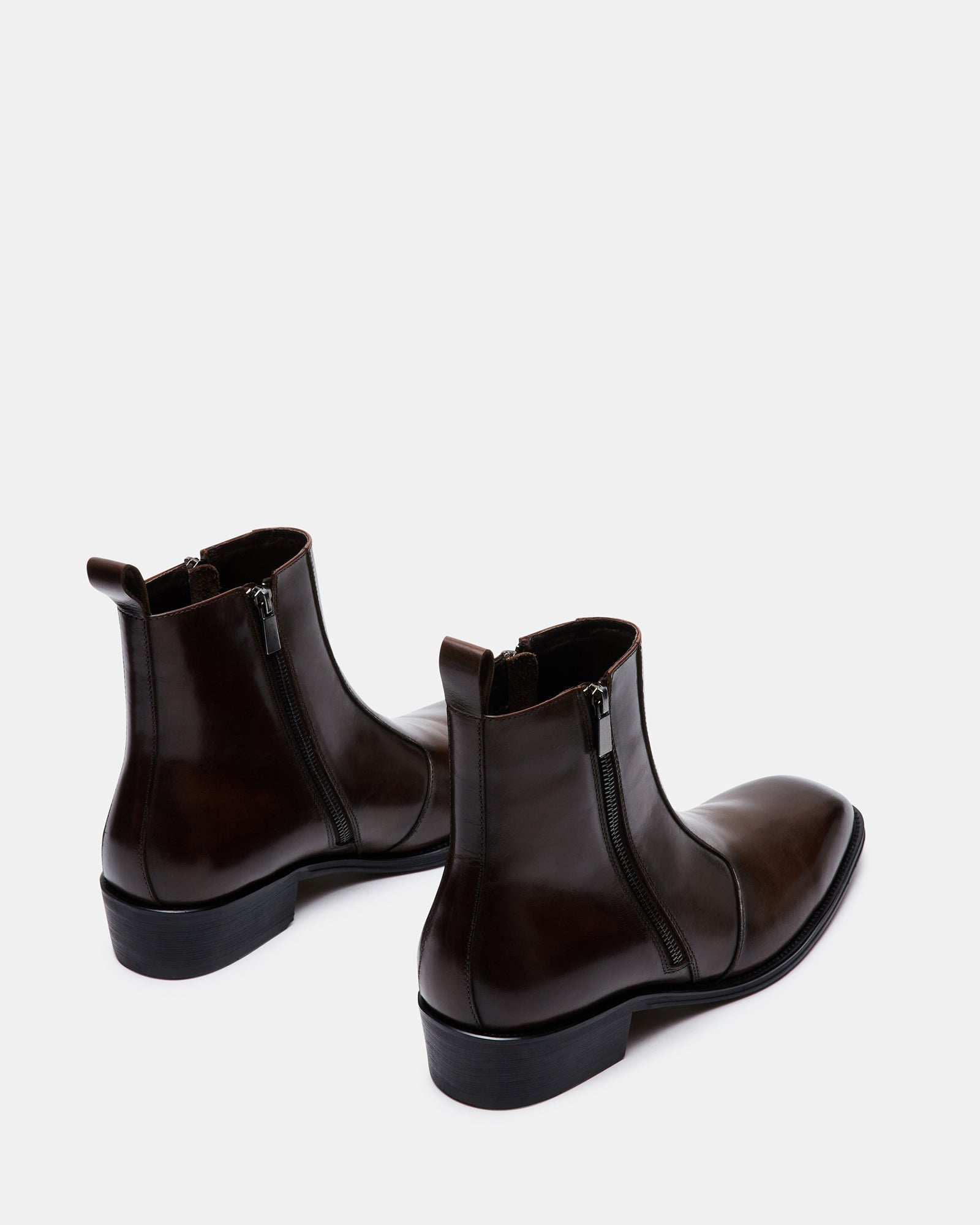 Close-up of the double zipper detail on the mens brown leather boots.