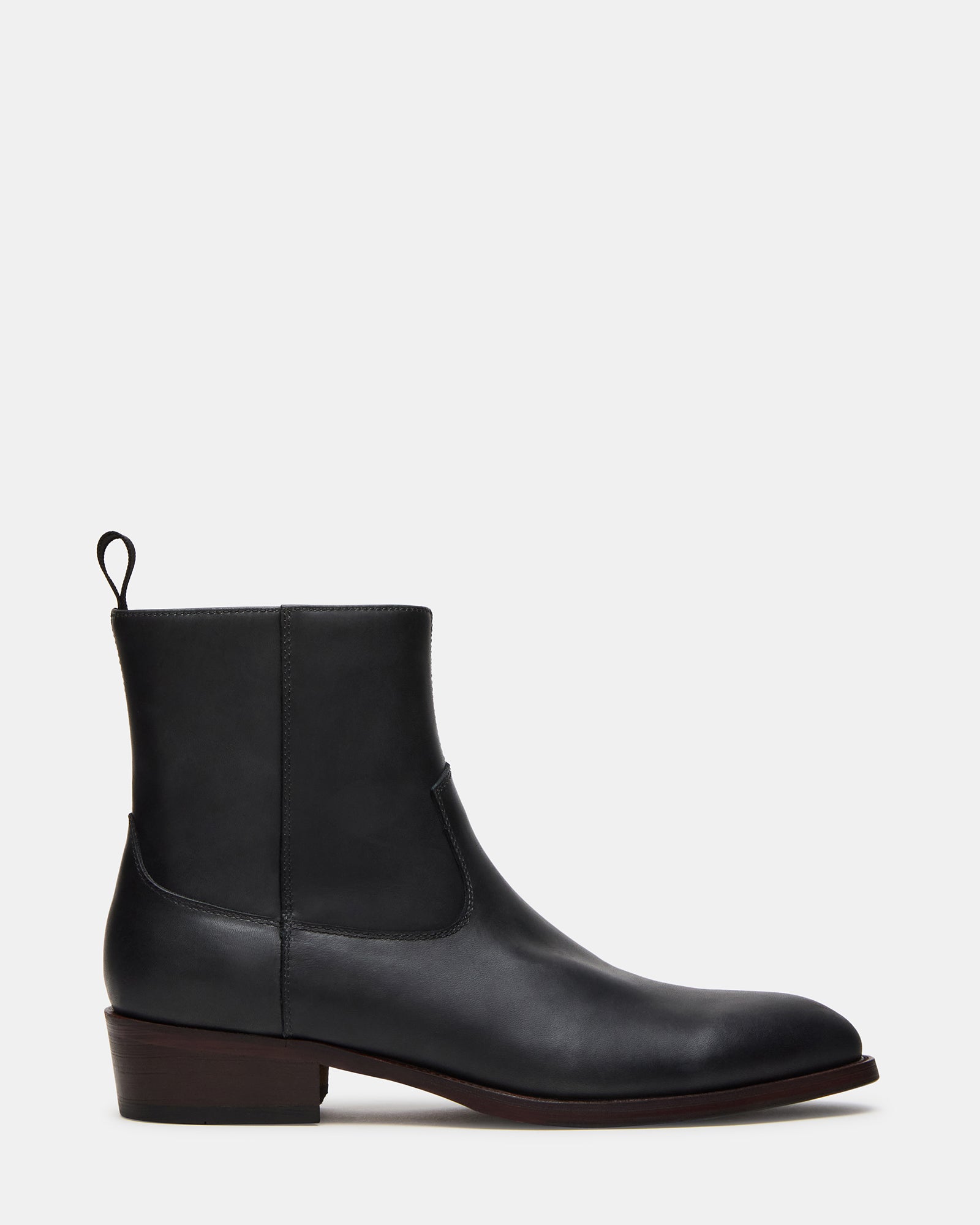 Close-up of Hendrik black leather boots showing polished finish and zip detail