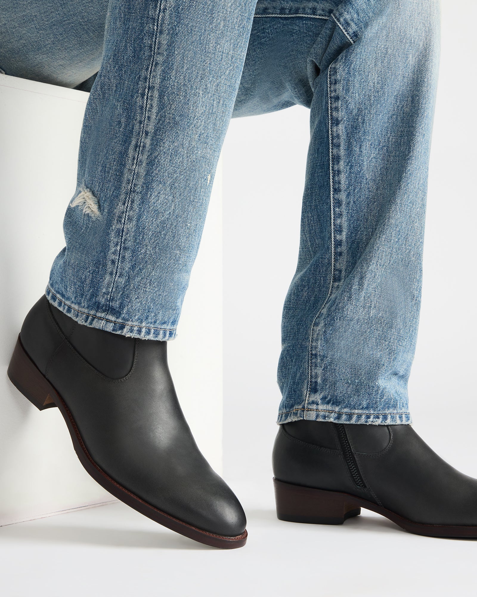 Hendrik boots worn with jeans in a casual Huntington Beach street setting