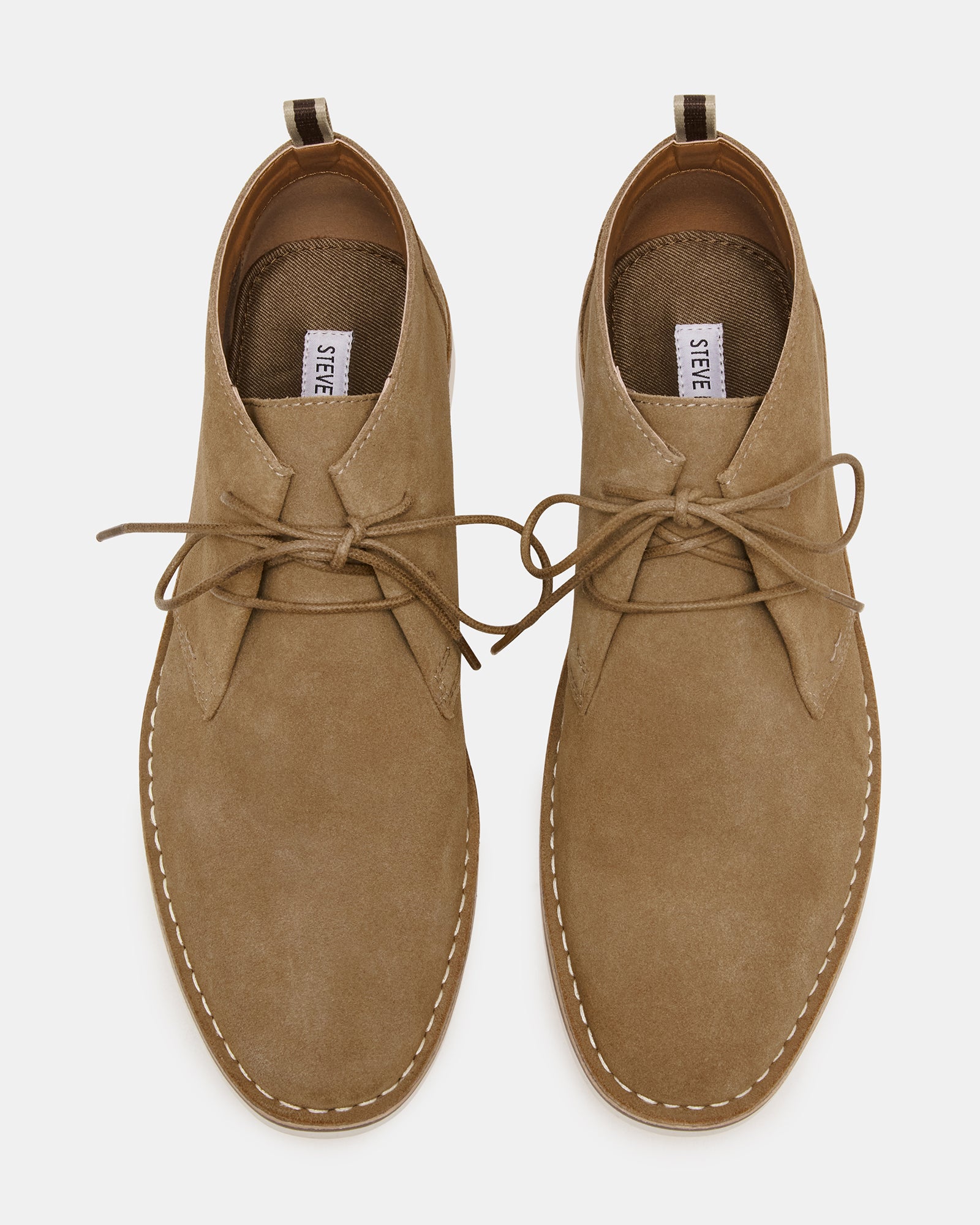 Close-up of the lace-up design of HERO cognac suede ankle boots.