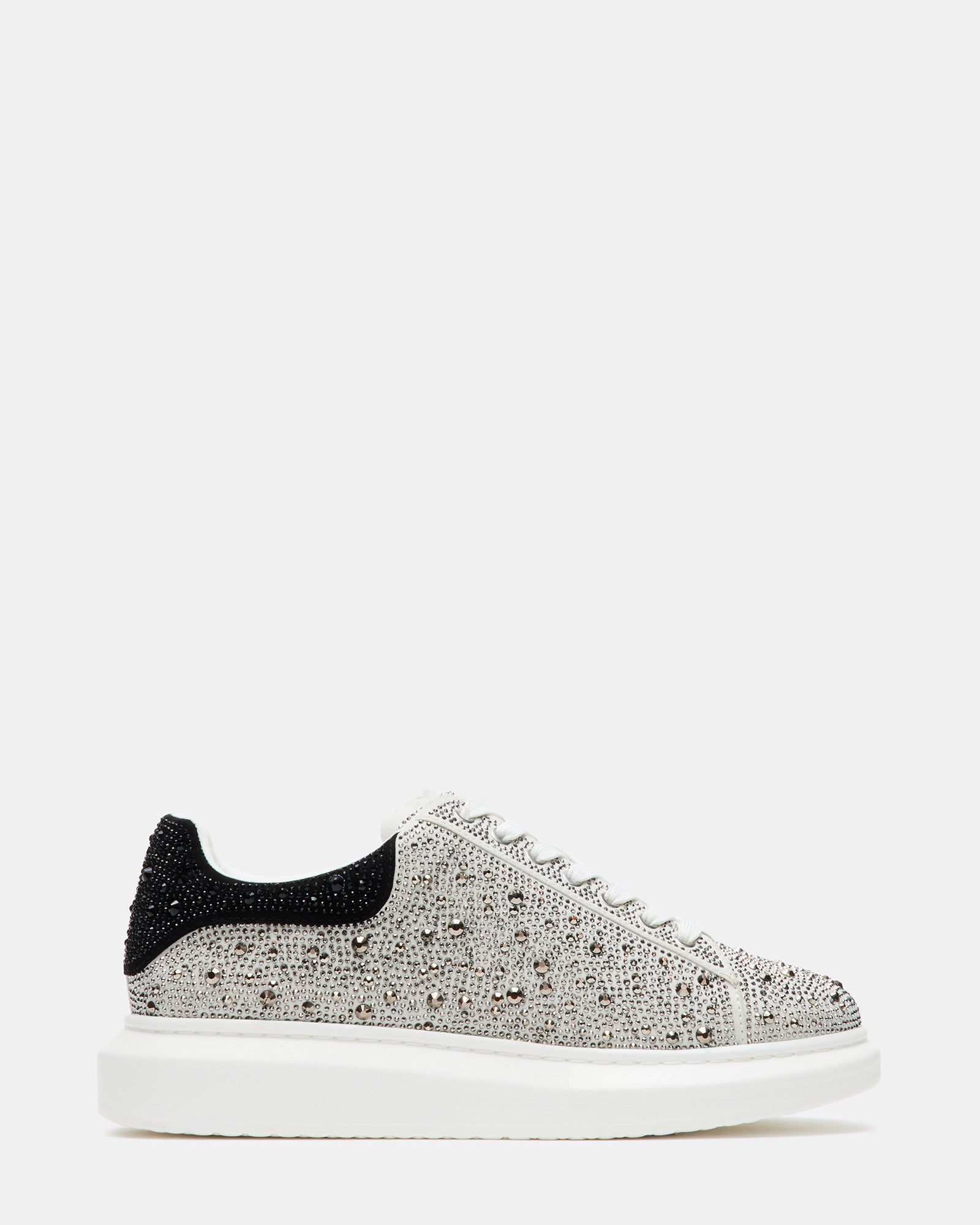 Side view of Icebox silver rhinestone platform sneakers highlighting the wide beveled sole