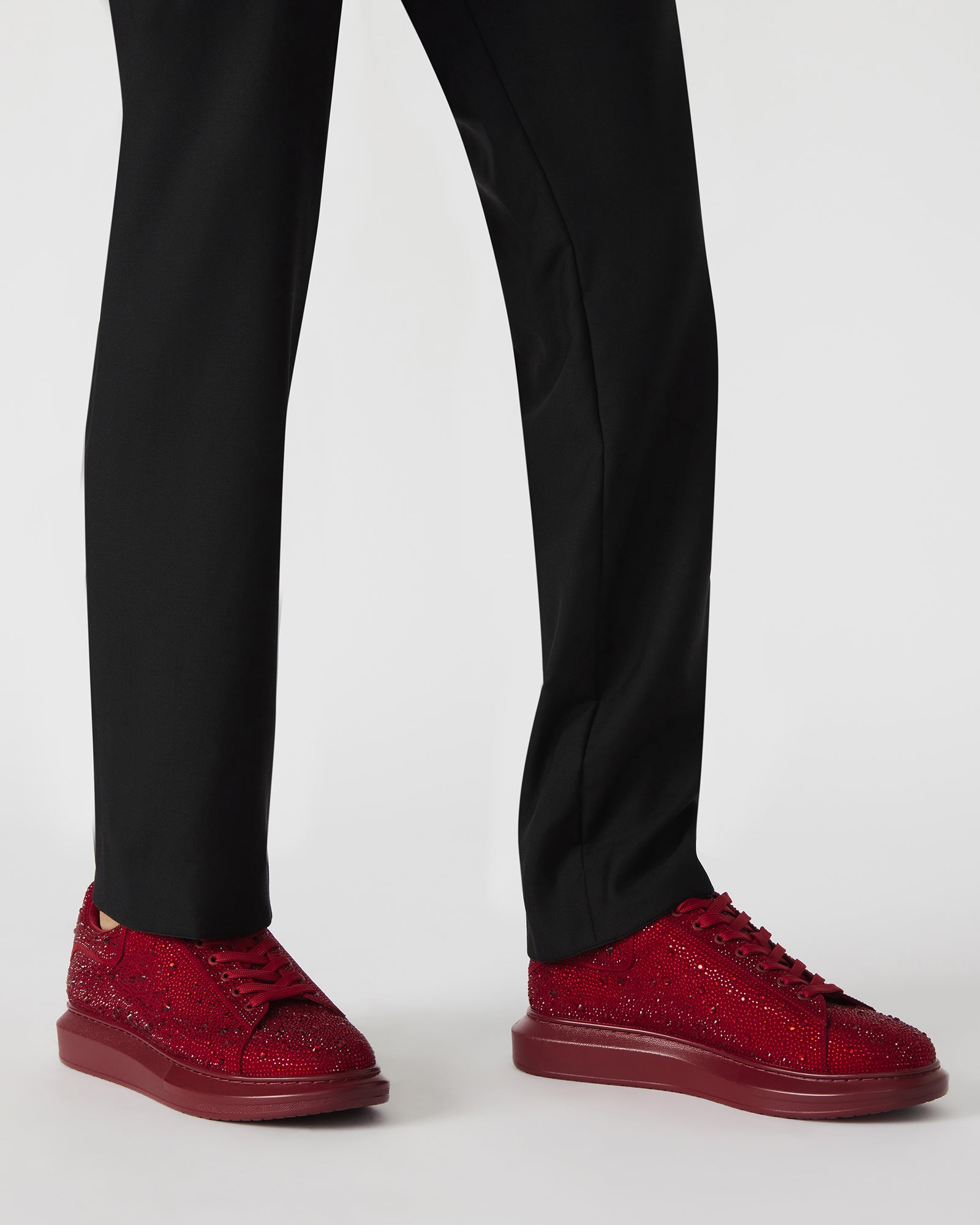 Side view showing wide platform sole and laced closure