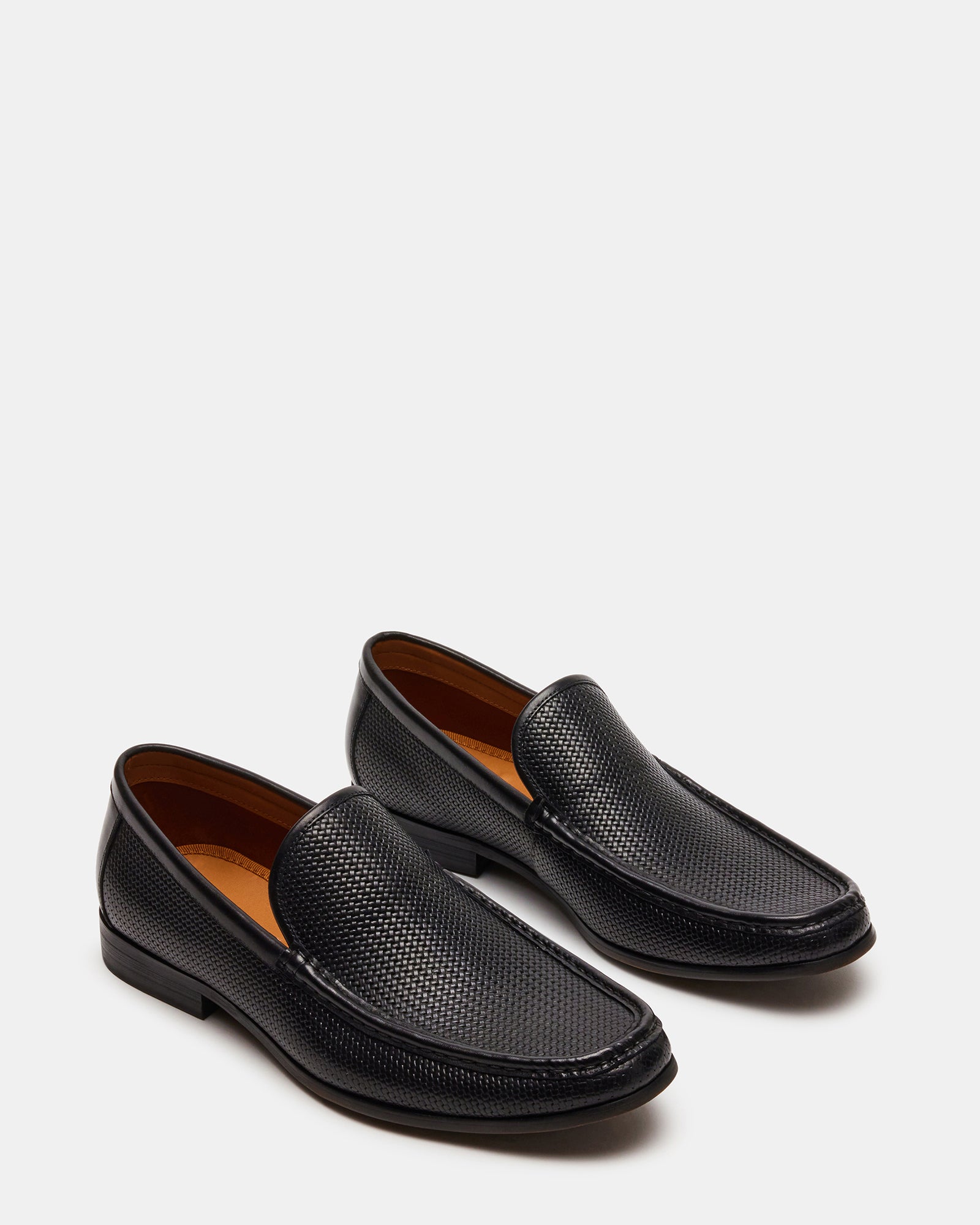 Close-up of leather texture and stitching on Jabrian loafers