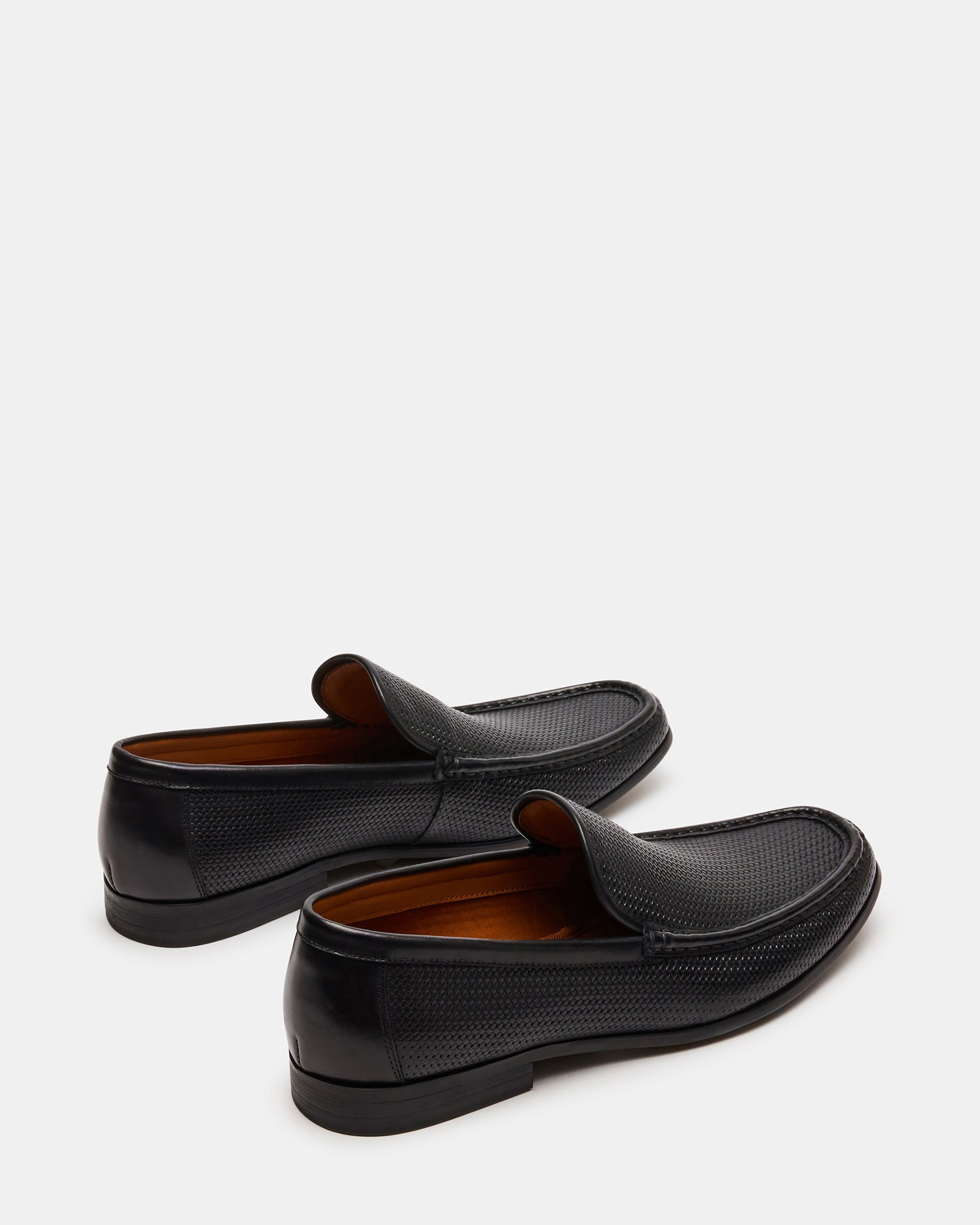 Close-up of leather texture and stitching on Jabrian loafers