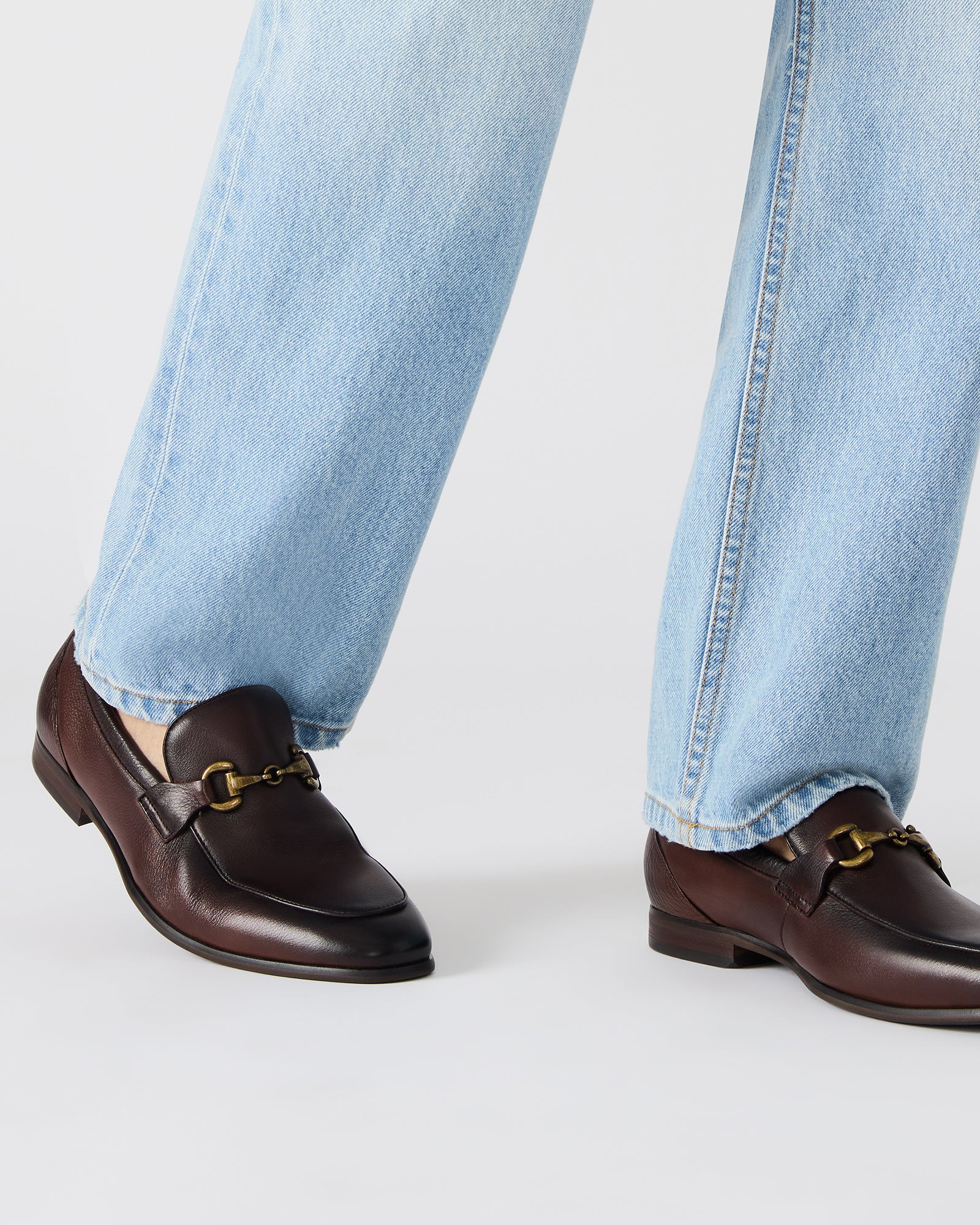 Side profile showcasing tumbled brown leather and 1-inch heel height