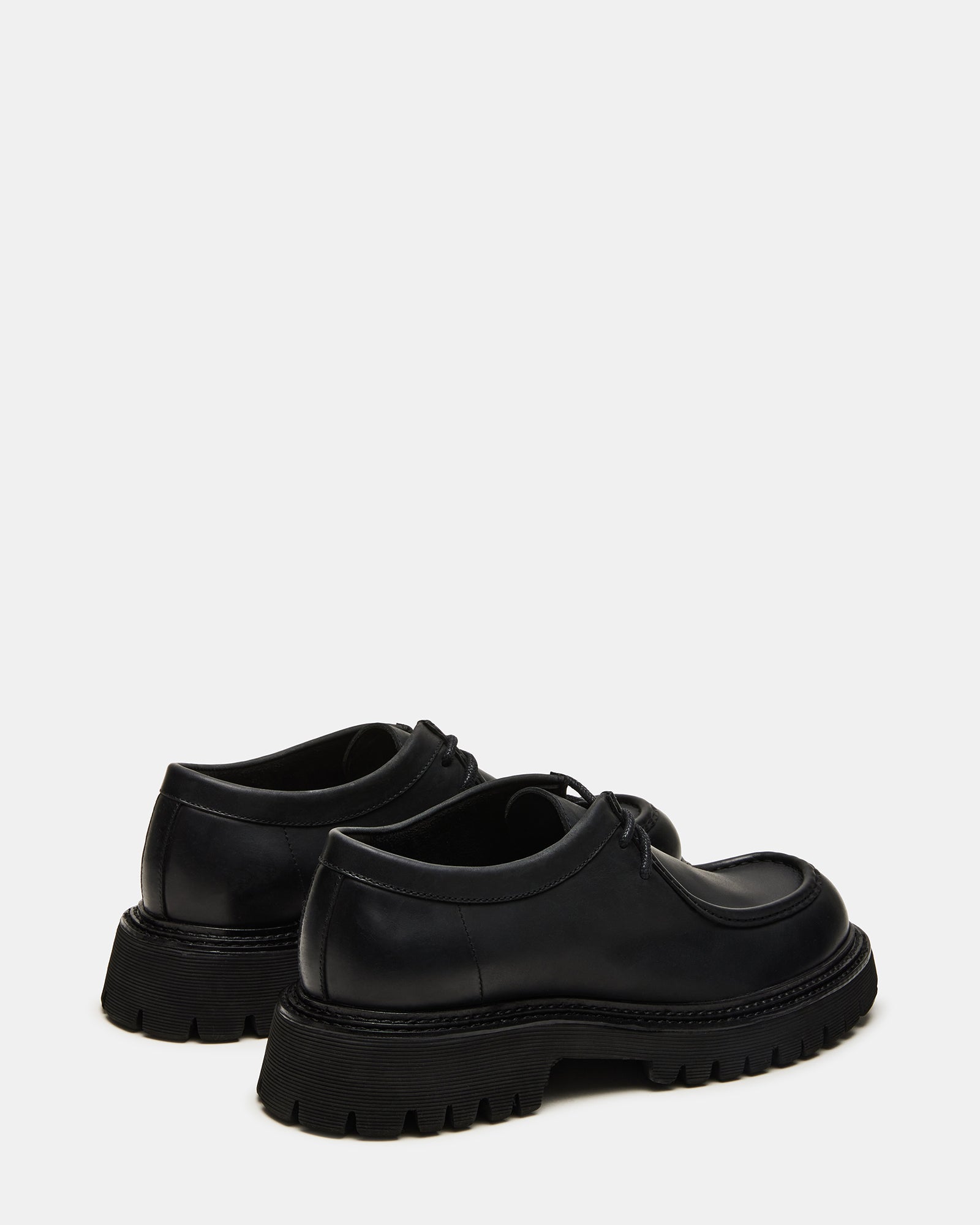 Close-up of the moc toe and chunky sole design on KALKIN dress shoes.