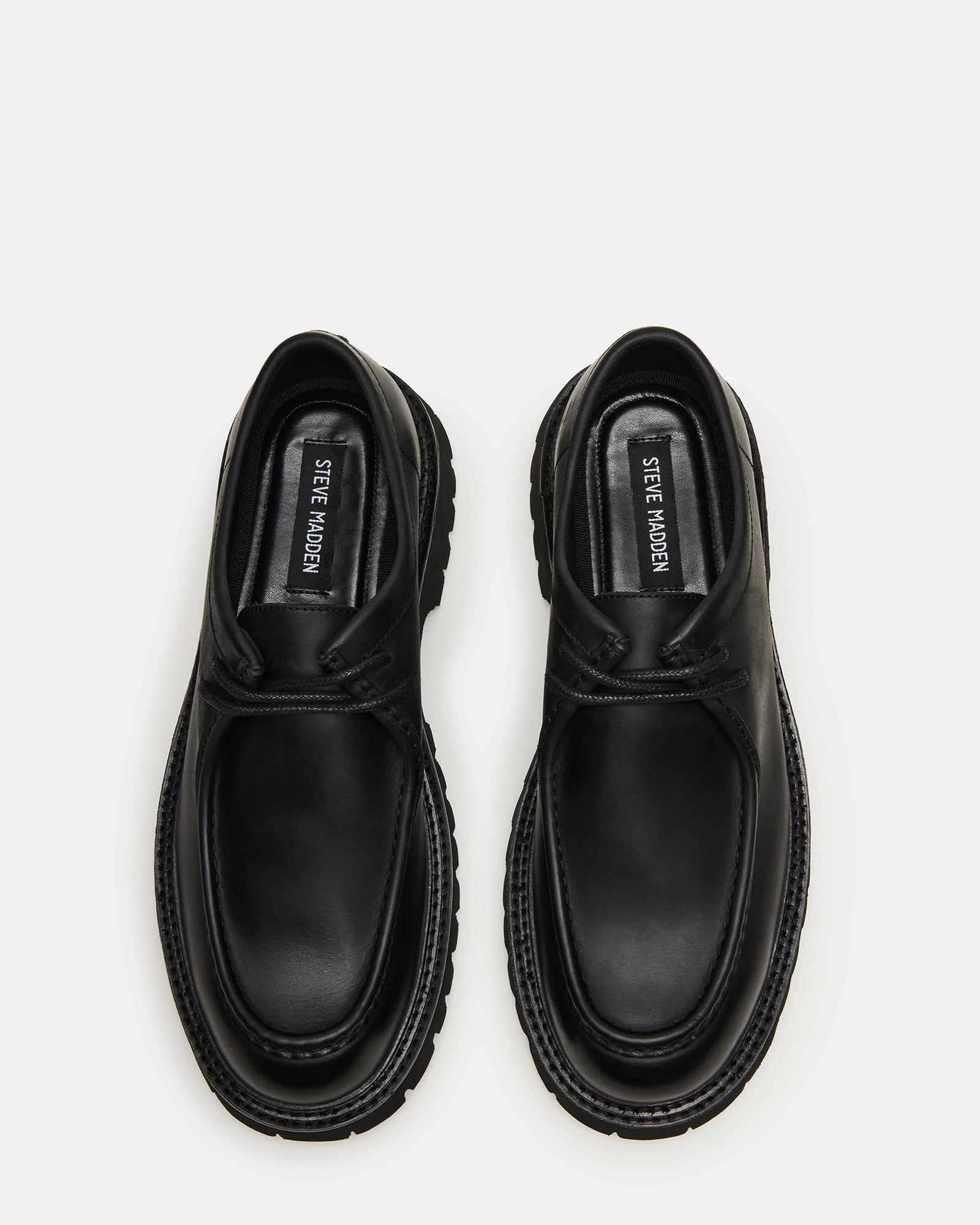 KALKIN mens black leather shoes showcased on a wooden bench for a rustic look.