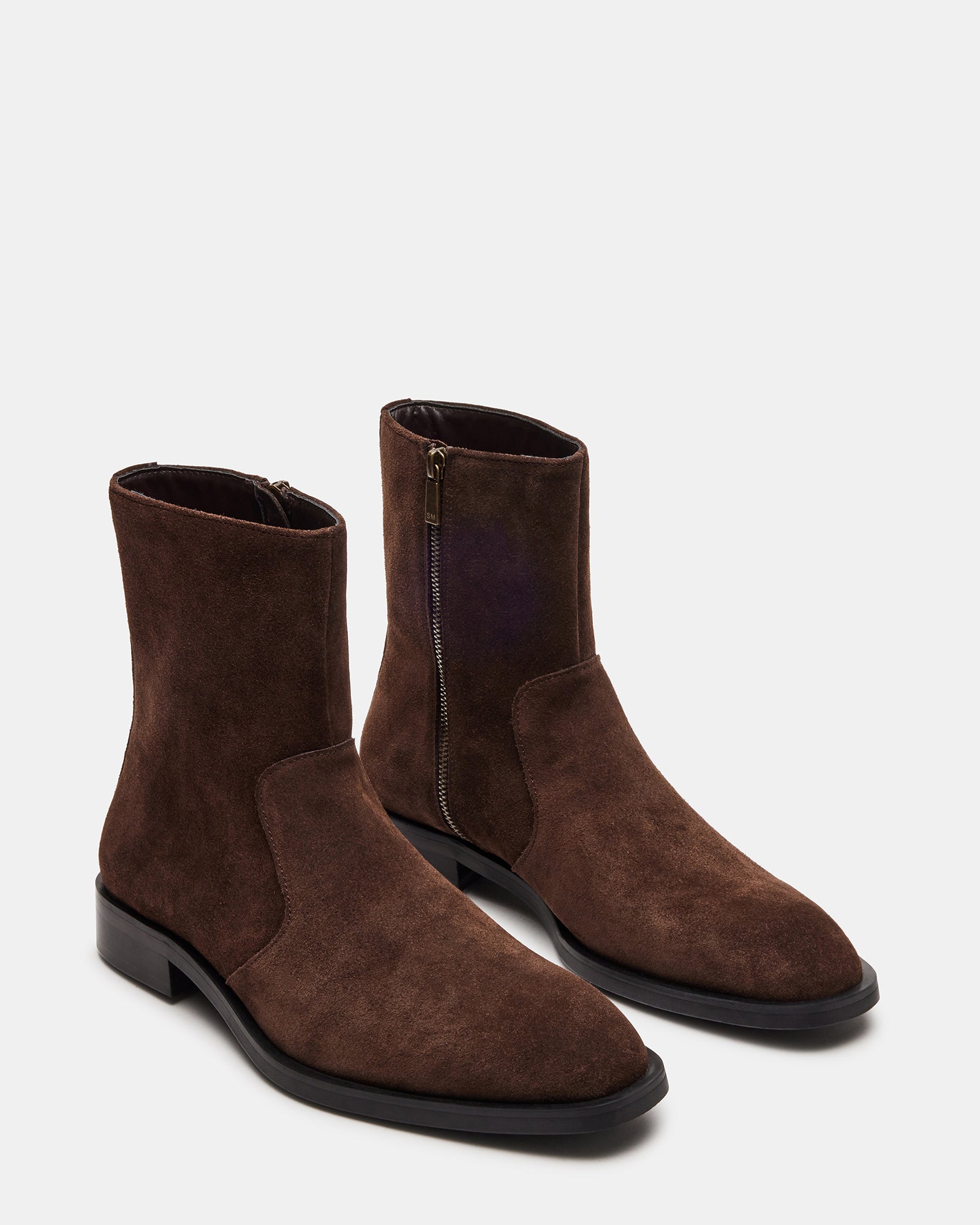 Close-up of the inside zipper on Kanna womens brown suede boots, emphasizing ease of wear.