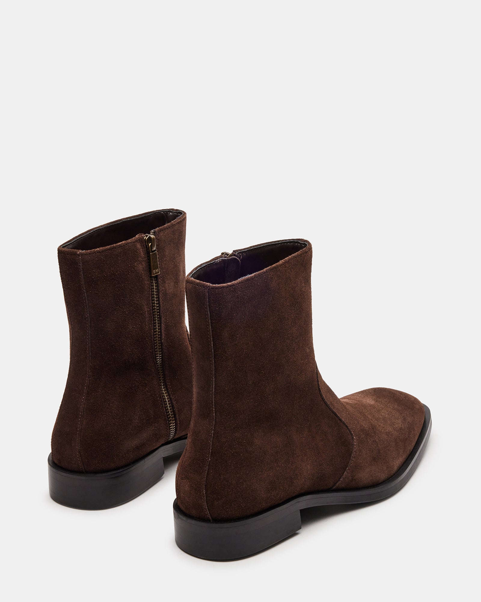 Close-up of the inside zipper on Kanna womens brown suede boots, emphasizing ease of wear.