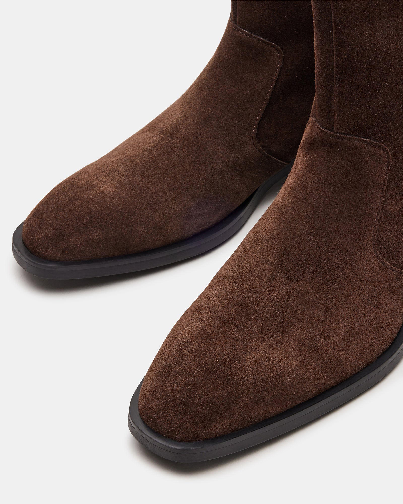Kanna brown suede boots paired with casual outfit, perfect for everyday fashion.