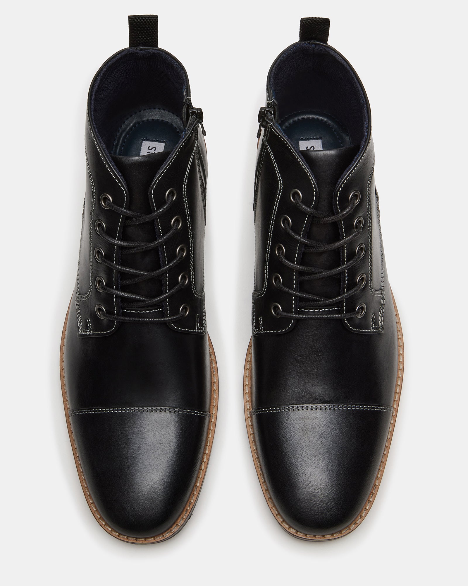 Front angle of black leather boots highlighting lace-up and zip details