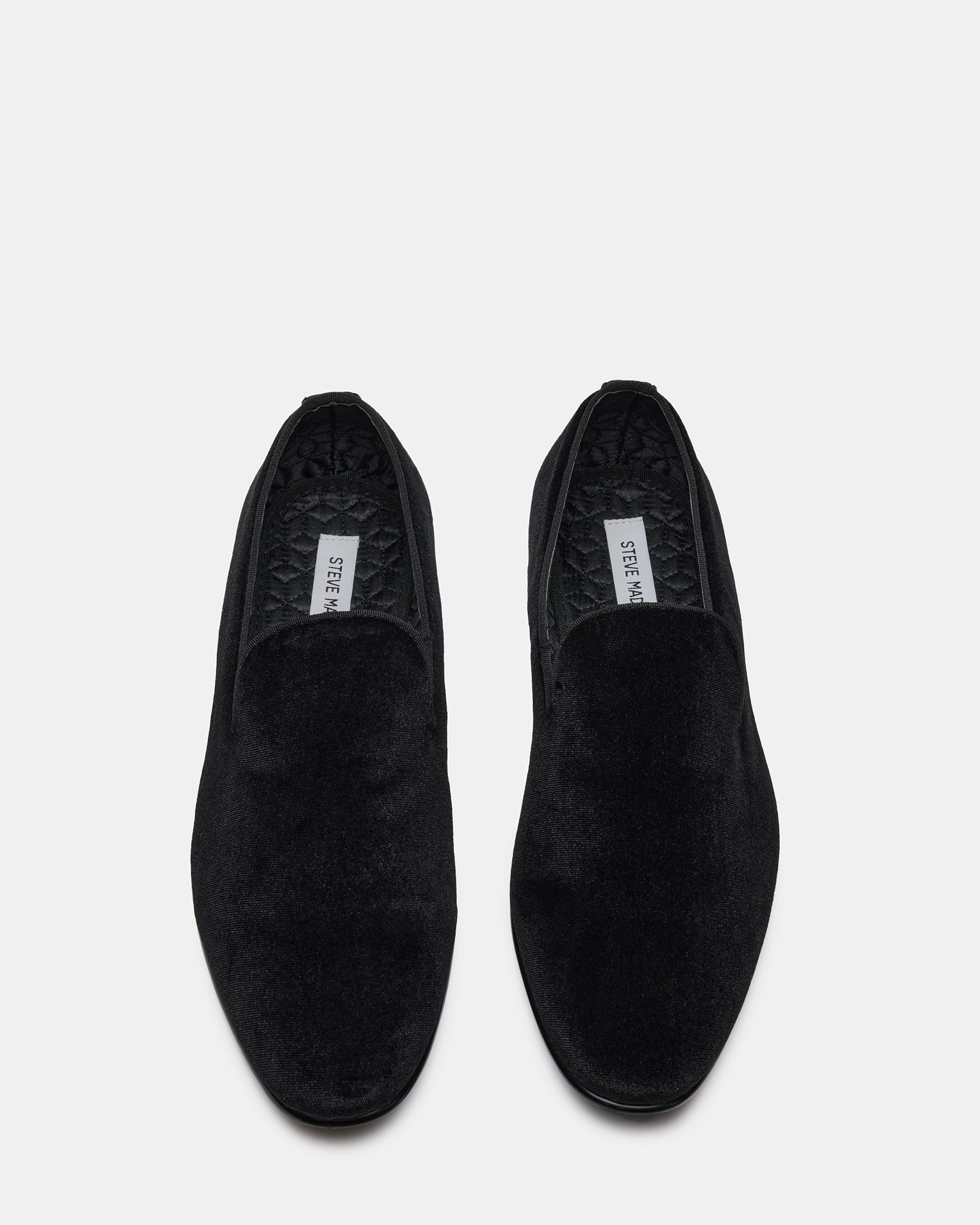 Lifestyle image of men and women wearing velvet loafers for a refined look