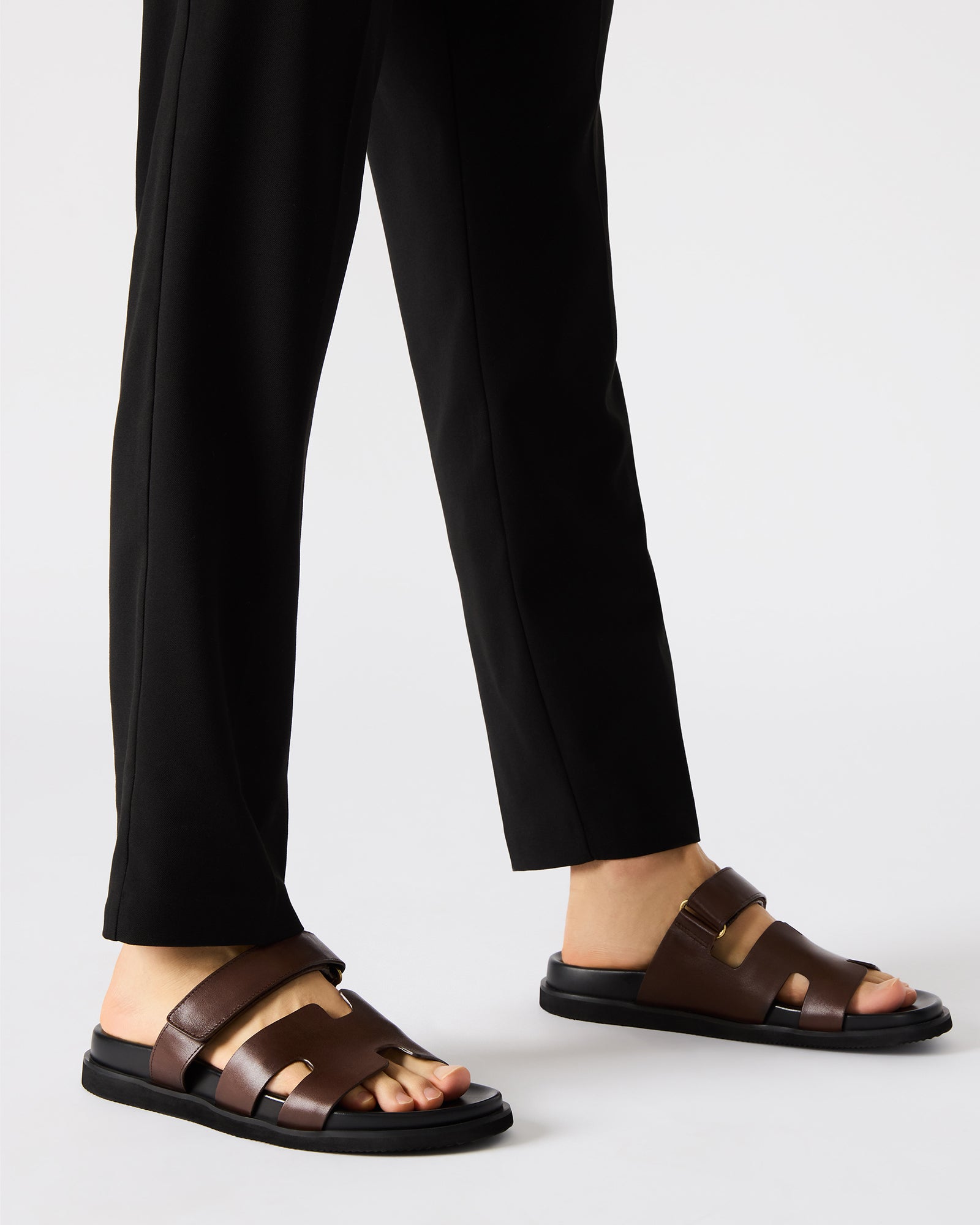 Close-up of MAIVEN sandals highlighting the textile lining and sole.