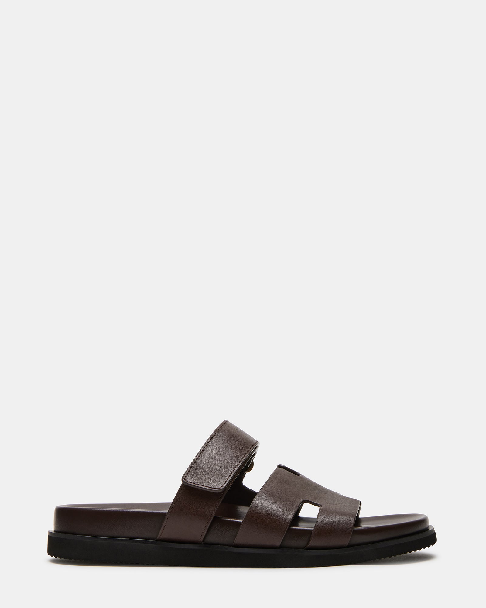 Side view of MAIVEN sandals showcasing leather upper and heel height.