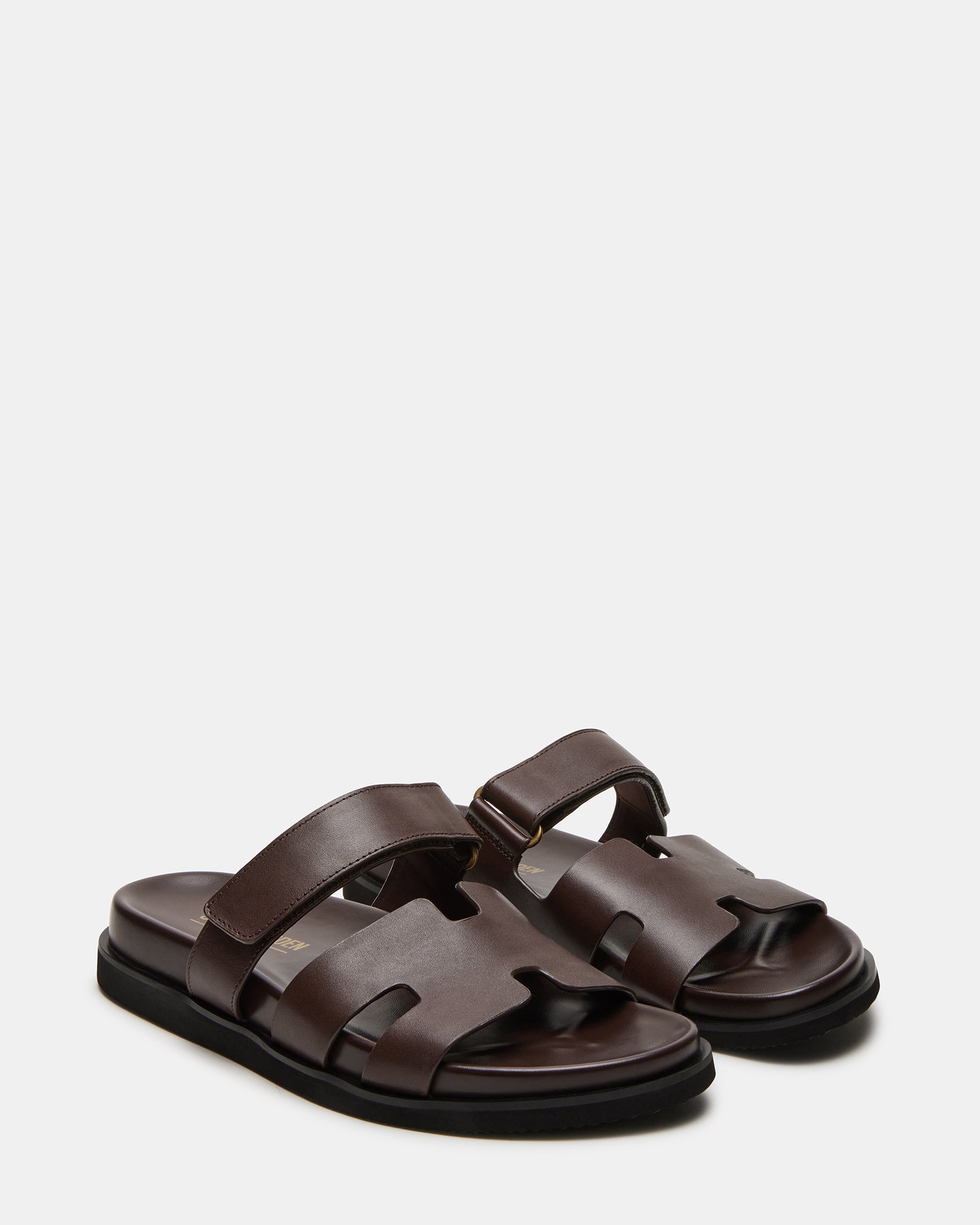 User wearing MAIVEN sandals at a summer beach party.
