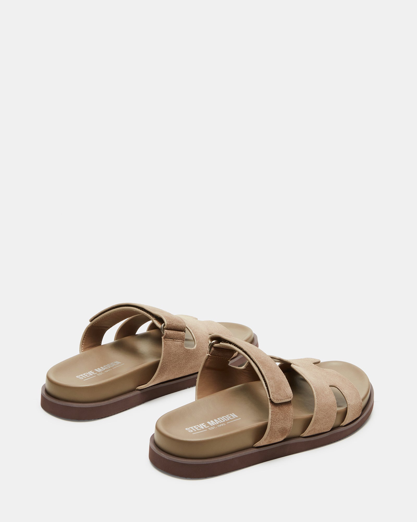 Flat lay of taupe suede sandals paired with summer outfits, perfect for casual outings.