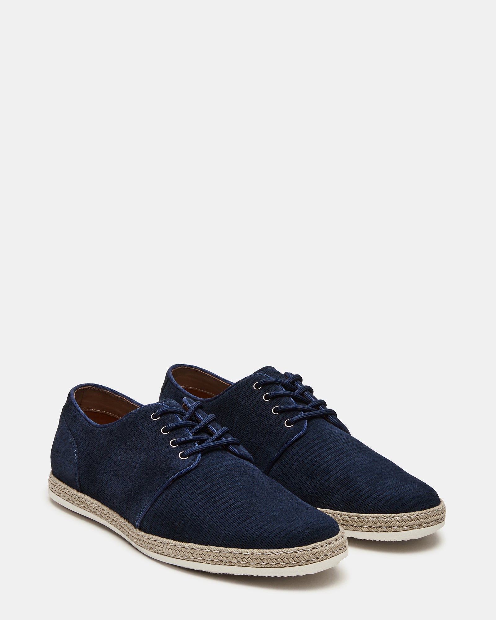 Styled view of Menorca Navy suede shoes paired with dress pants for a formal look