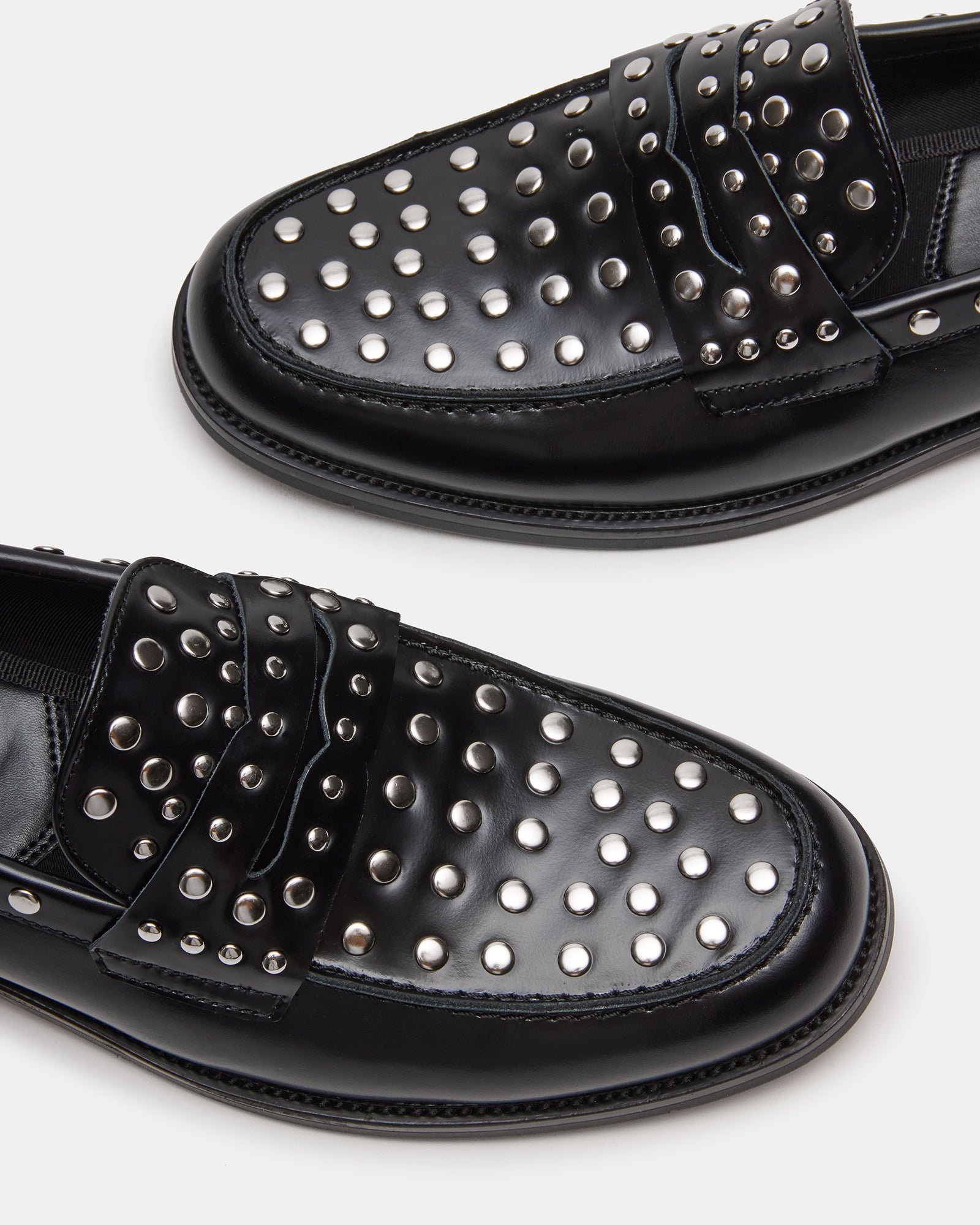 Slip-on loafers styled with casual jeans for weekend wear
