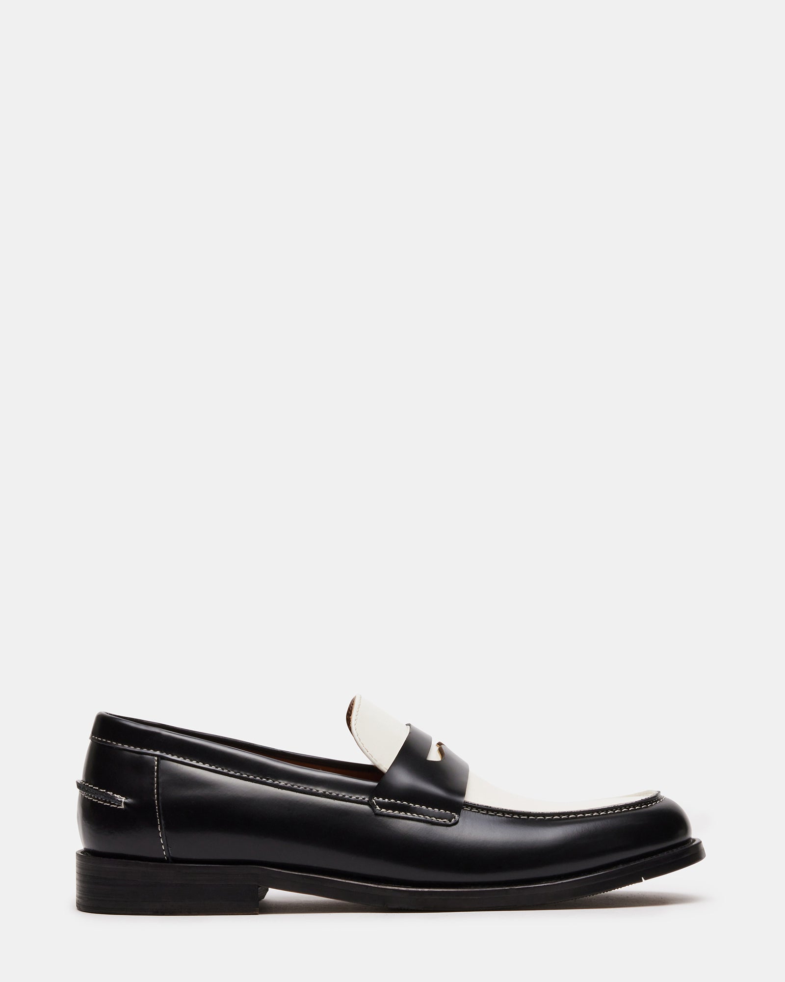 NATAN leather loafers in black-and-white, angled to show textured sole