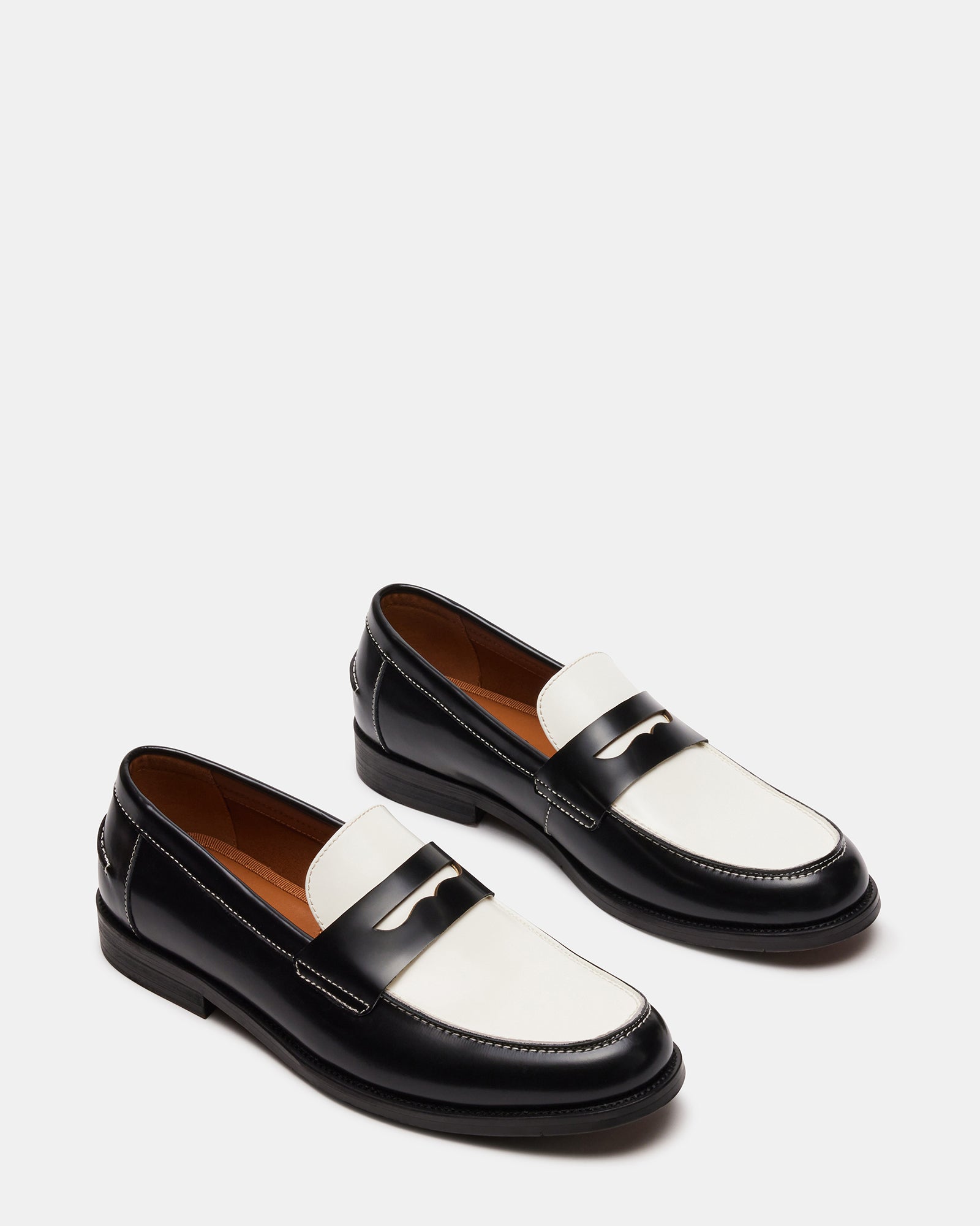 Loafers paired with navy blazer for polished NYC workplace attire