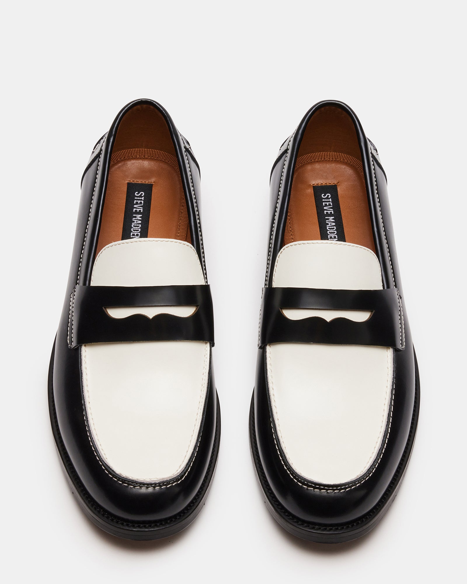 Close-up of penny slot detail on classic men’s loafers