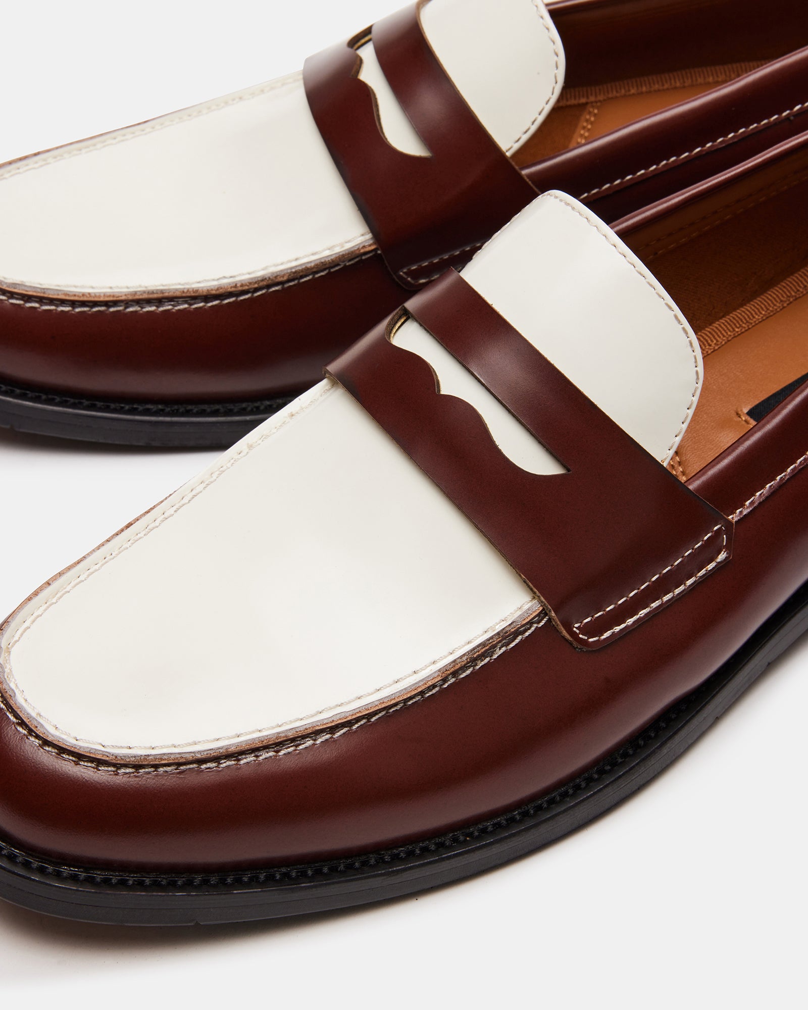 Close-up of NATAN Brown Multi loafers highlighting the leather texture.