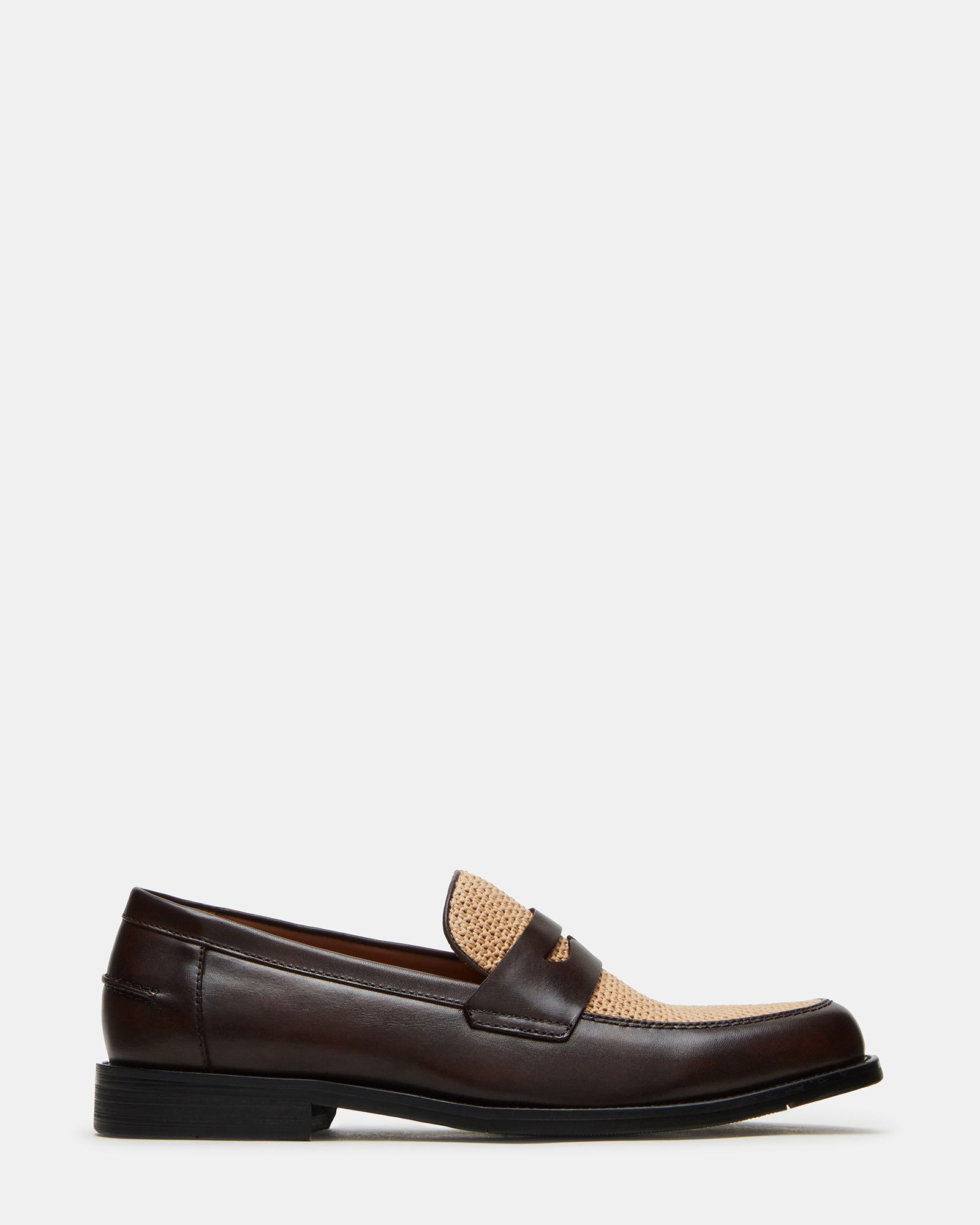 Angled view of leather mens loafers showcasing dress shoe stitching and dual-tone finish