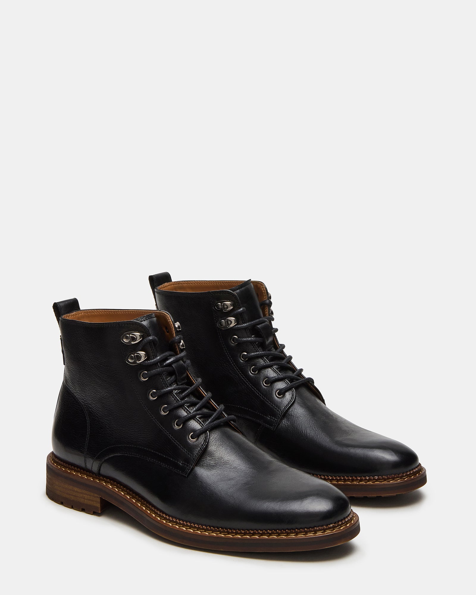 Noby black leather boots worn casually, demonstrating versatility and comfort.