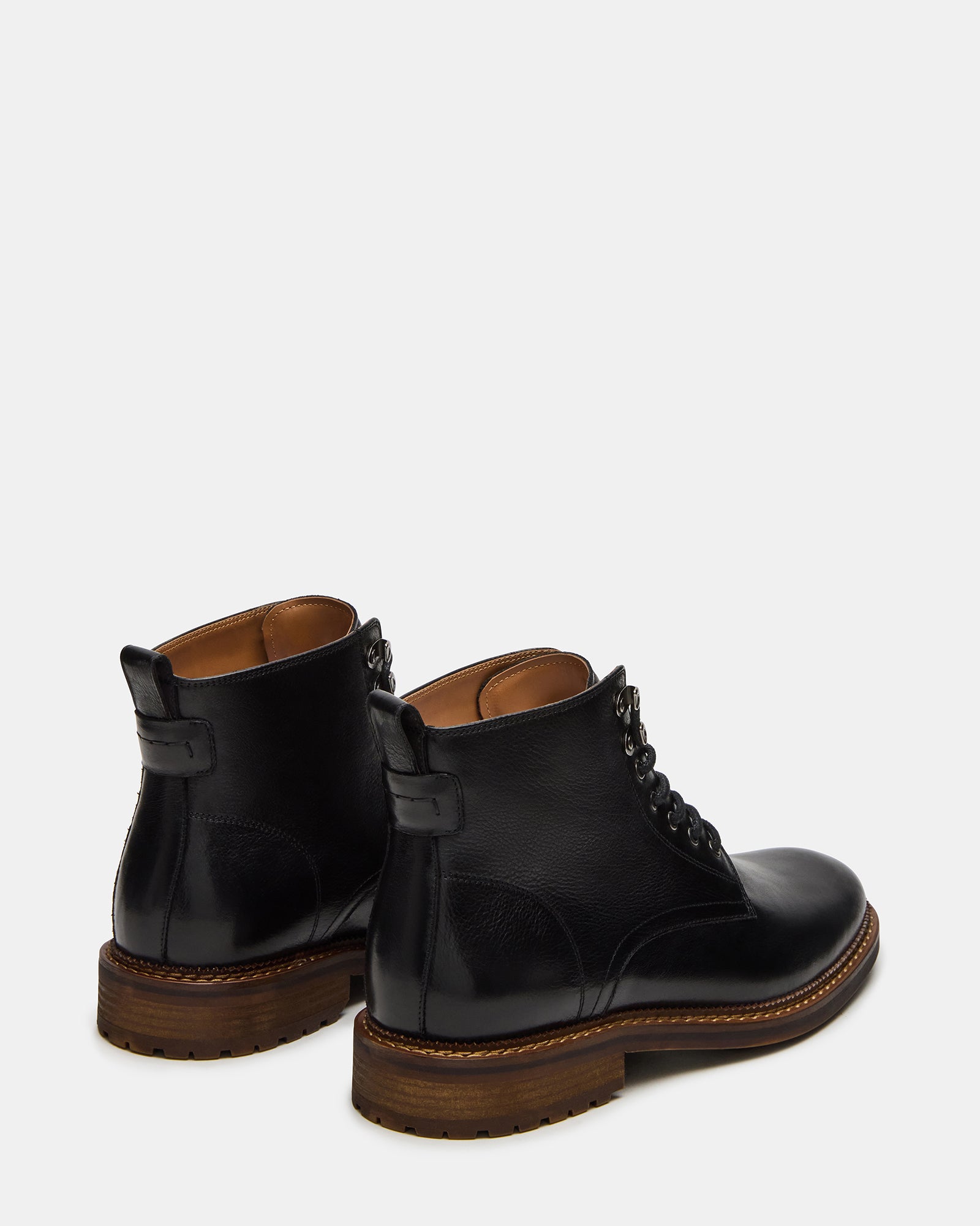 Noby black leather boots worn casually, demonstrating versatility and comfort.