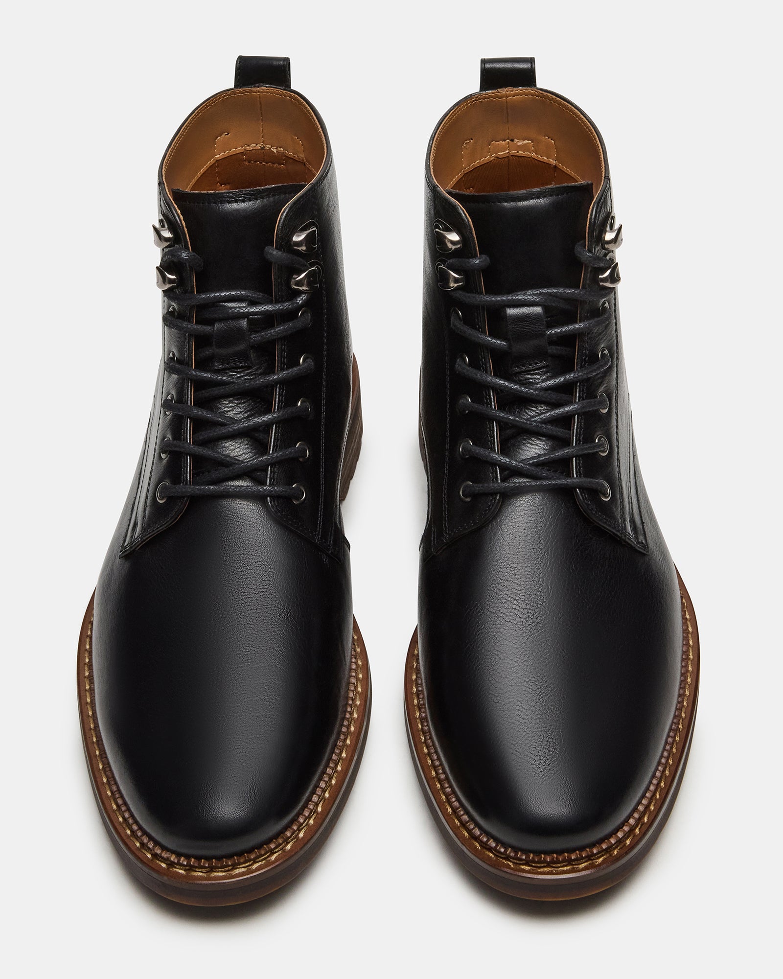Close-up of Noby black ankle boots with lace-up detailing, ideal for stylish wear.