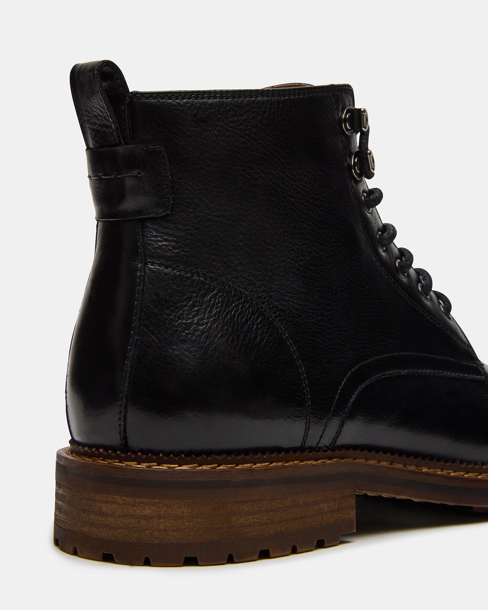 Side view of Noby lace-up black leather ankle boots, showcasing craftsmanship.