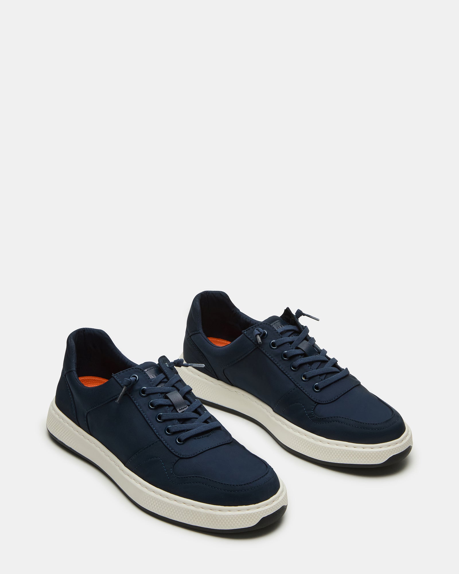 Side view of mens casual shoes highlighting the textile upper and rubber sole