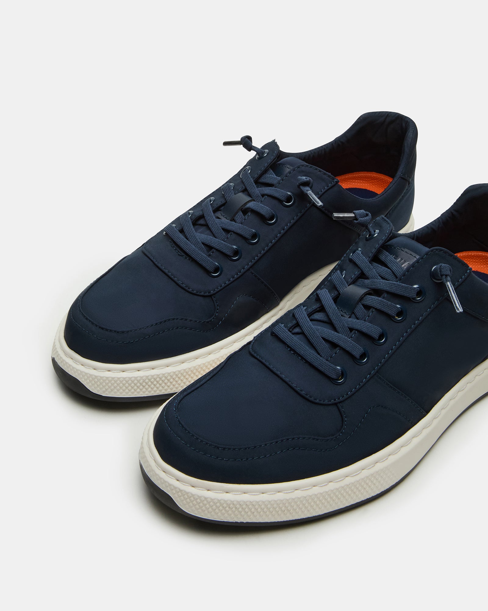 Man wearing NOUCKIA navy casual shoes styled for business casual or casual outings