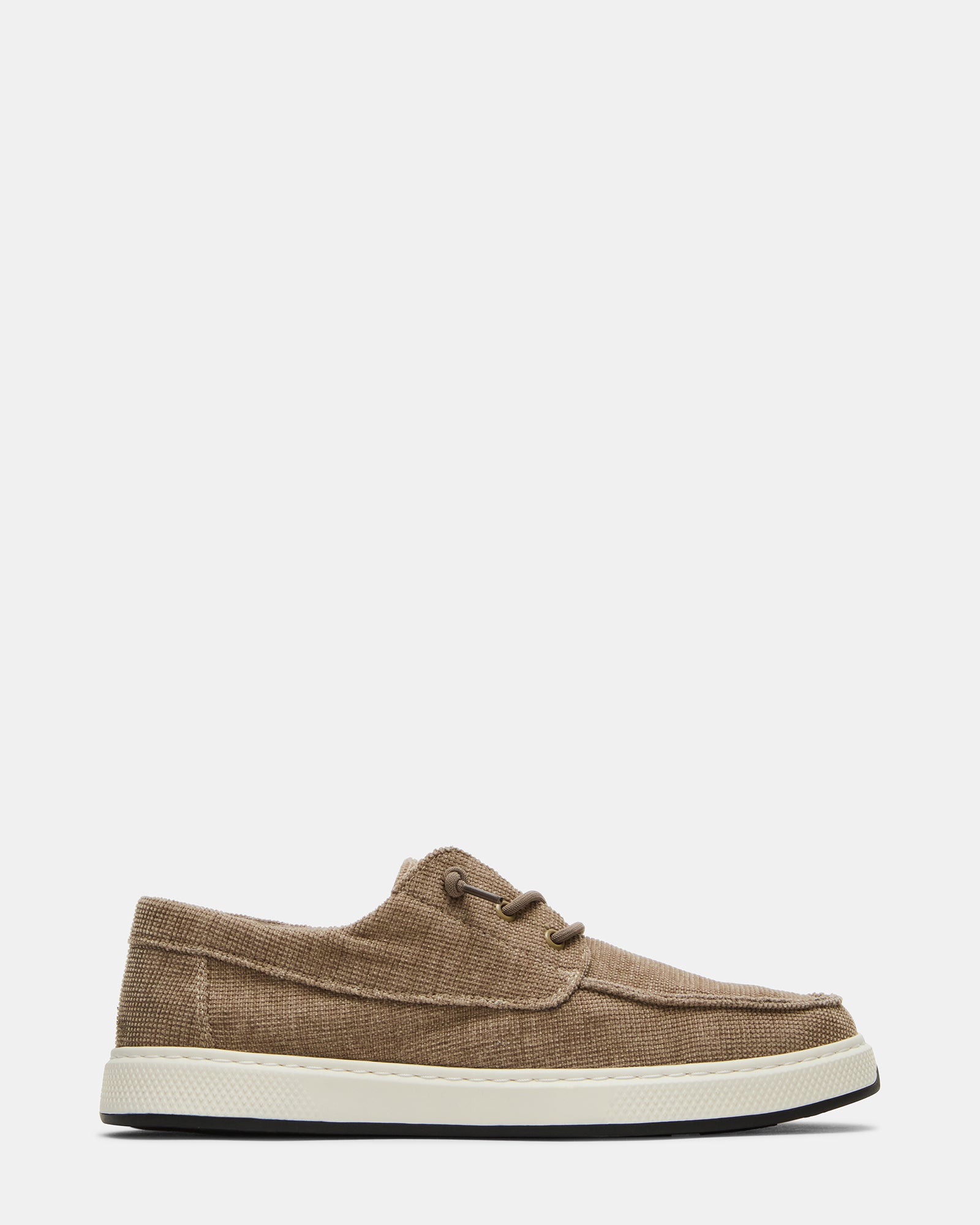Close-up of NUSCHI taupe slip-on shoes highlighting the rounded toe and textile upper